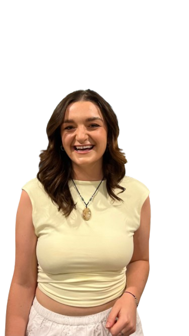 Smiling woman with long hair wearing a sleeveless top and necklace