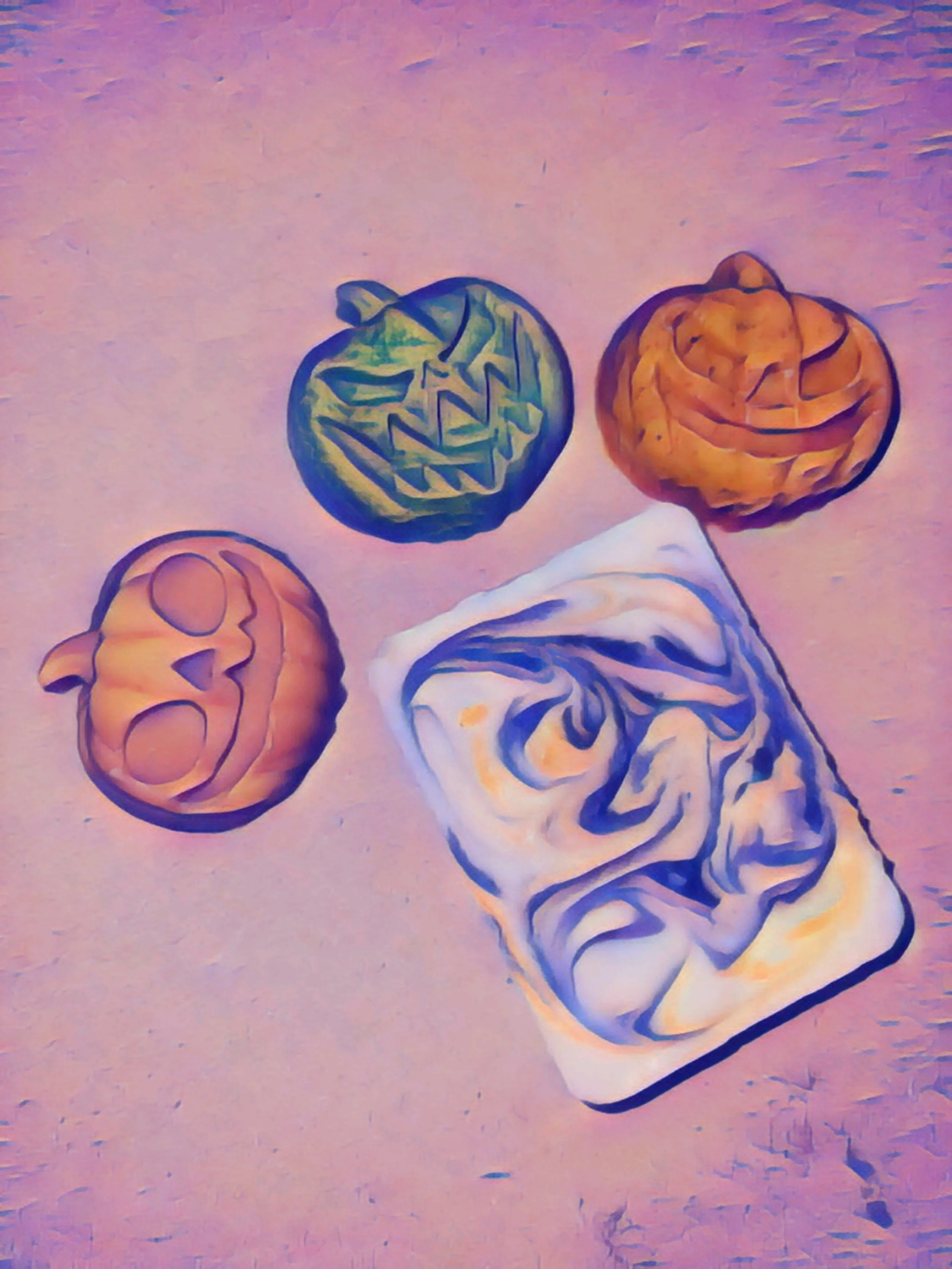 This is an altered image of 3 pumpkins and one soap bar that provides a hint of some of the limited edition soaps.