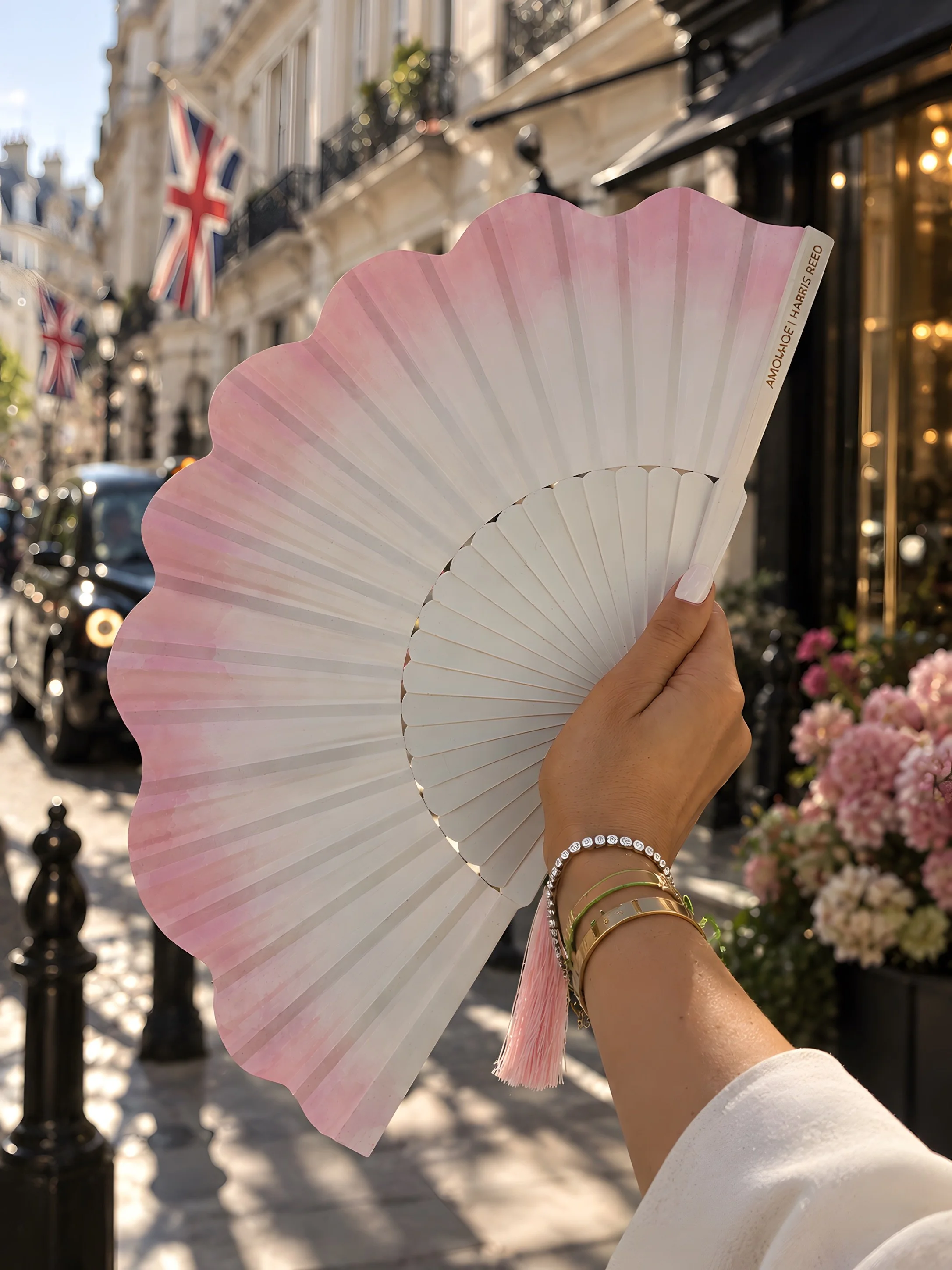 Bespoke luxury hand fan created by Island Whisper Atelier for Amouage, featuring an elegant pink and ivory design for a luxury brand experience in London.