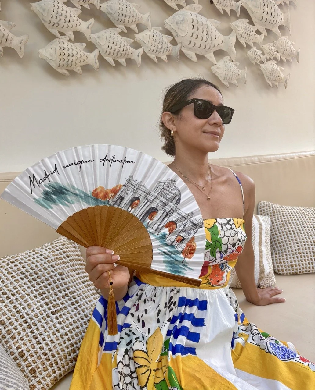 Bespoke hand fan featuring original illustrated artwork, created as an elegant accessory for hotels, destinations and special events.