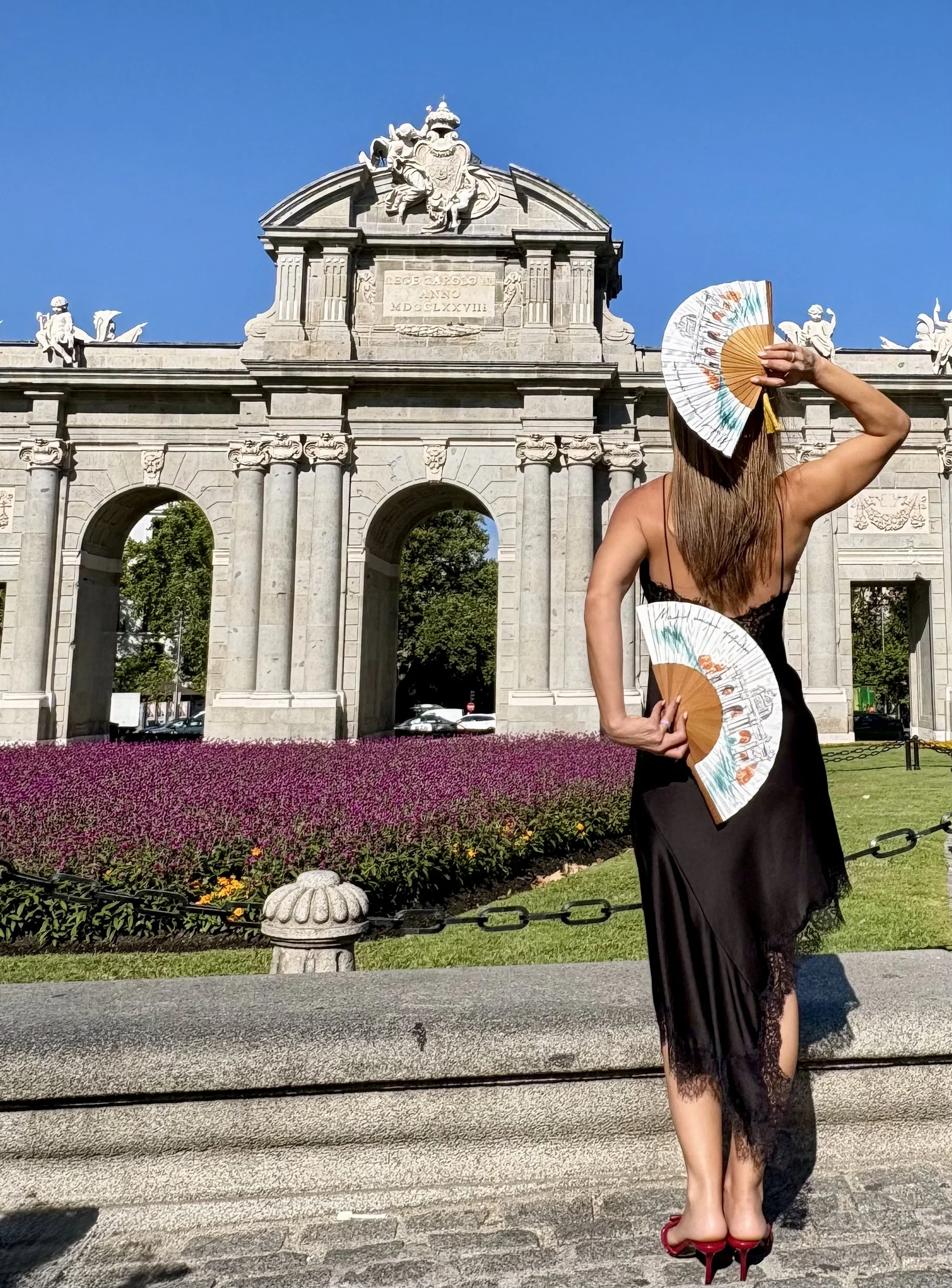 Bespoke luxury hand fans featuring original watercolour artwork inspired by Madrid's Puerta de Alcalá for Madrid Destino's international tourism event.