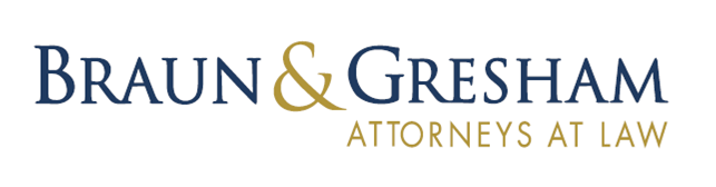 Braun & Gresham Attorneys at Law logo with text in navy and gold.