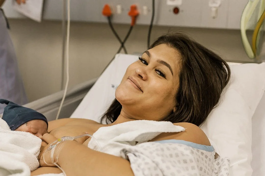 Mom in hospital bed smiling, licensed, Upstream Birth-k.jpg