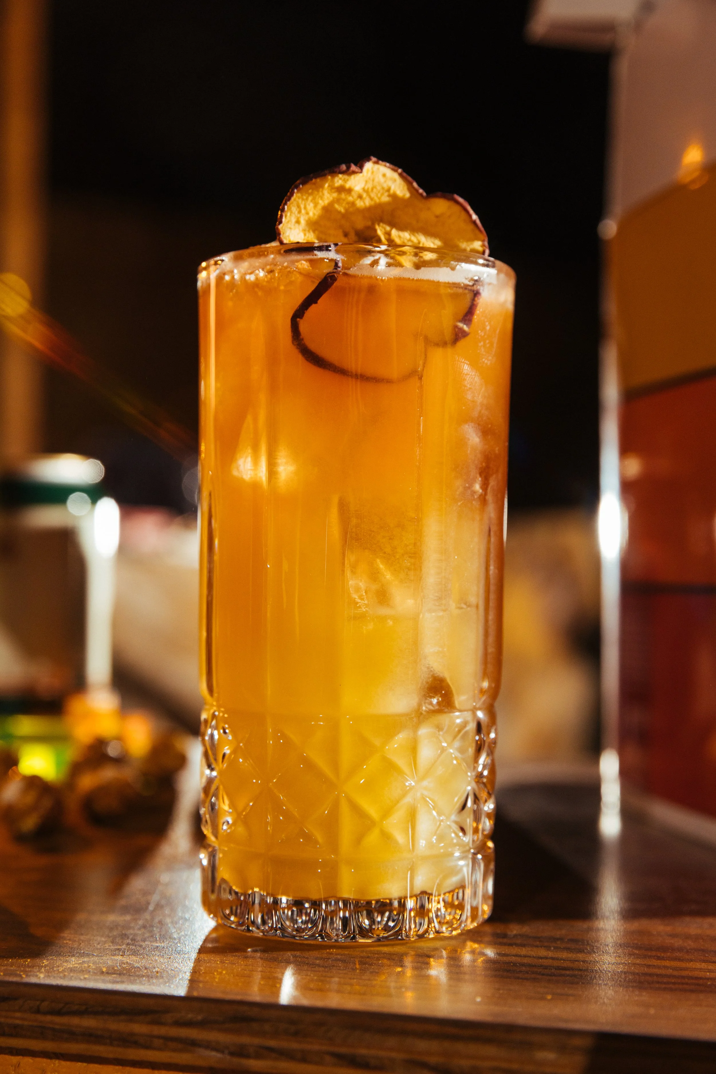 Cyclone — Mezcal, spiced pear, apple, ginger, cinnamon and lime with an Angostura float.