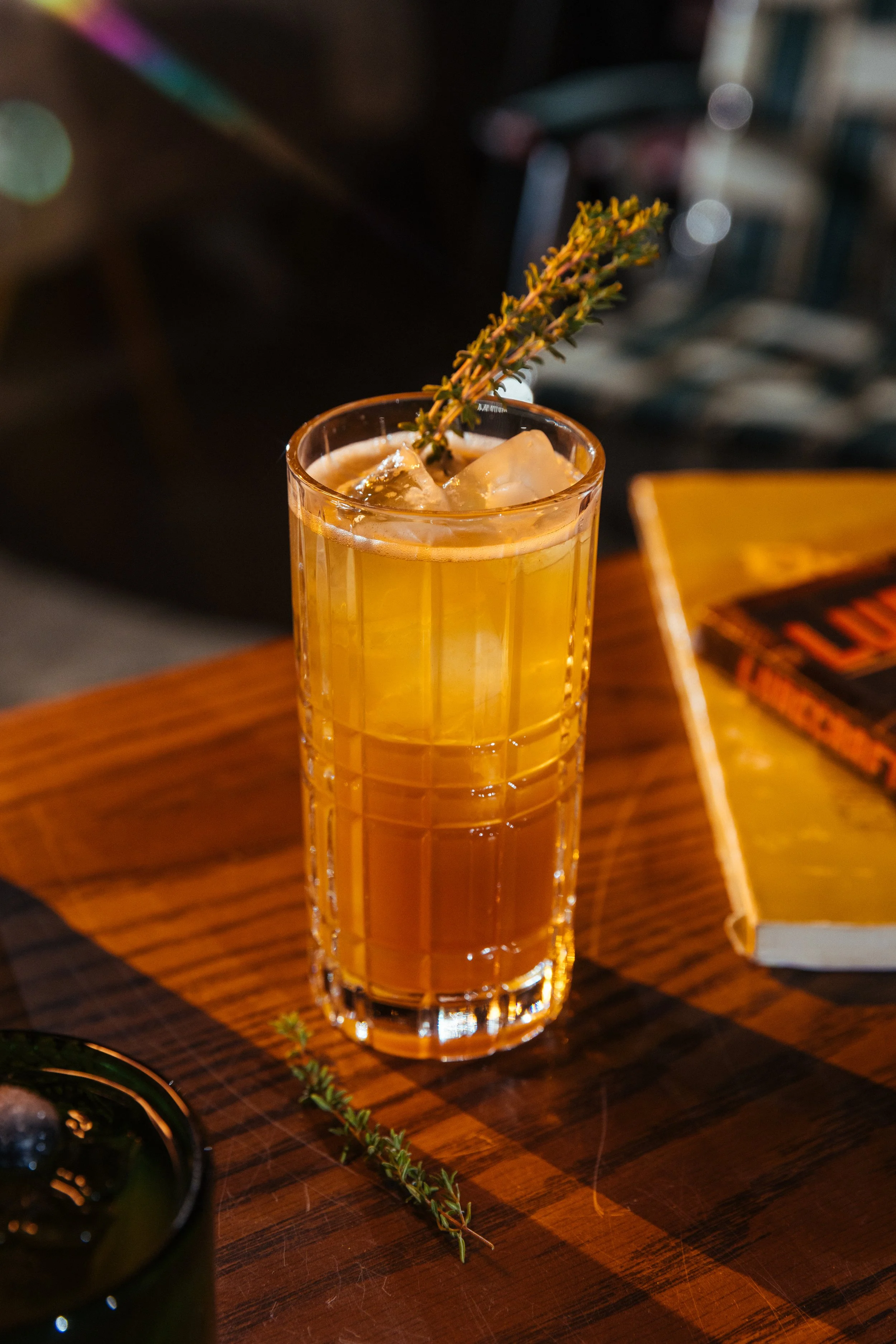 Skylark — Honey vodka and stone fruit spirit infused with Earl Grey, with peach, brown sugar, cinnamon, sherry and torched thyme.