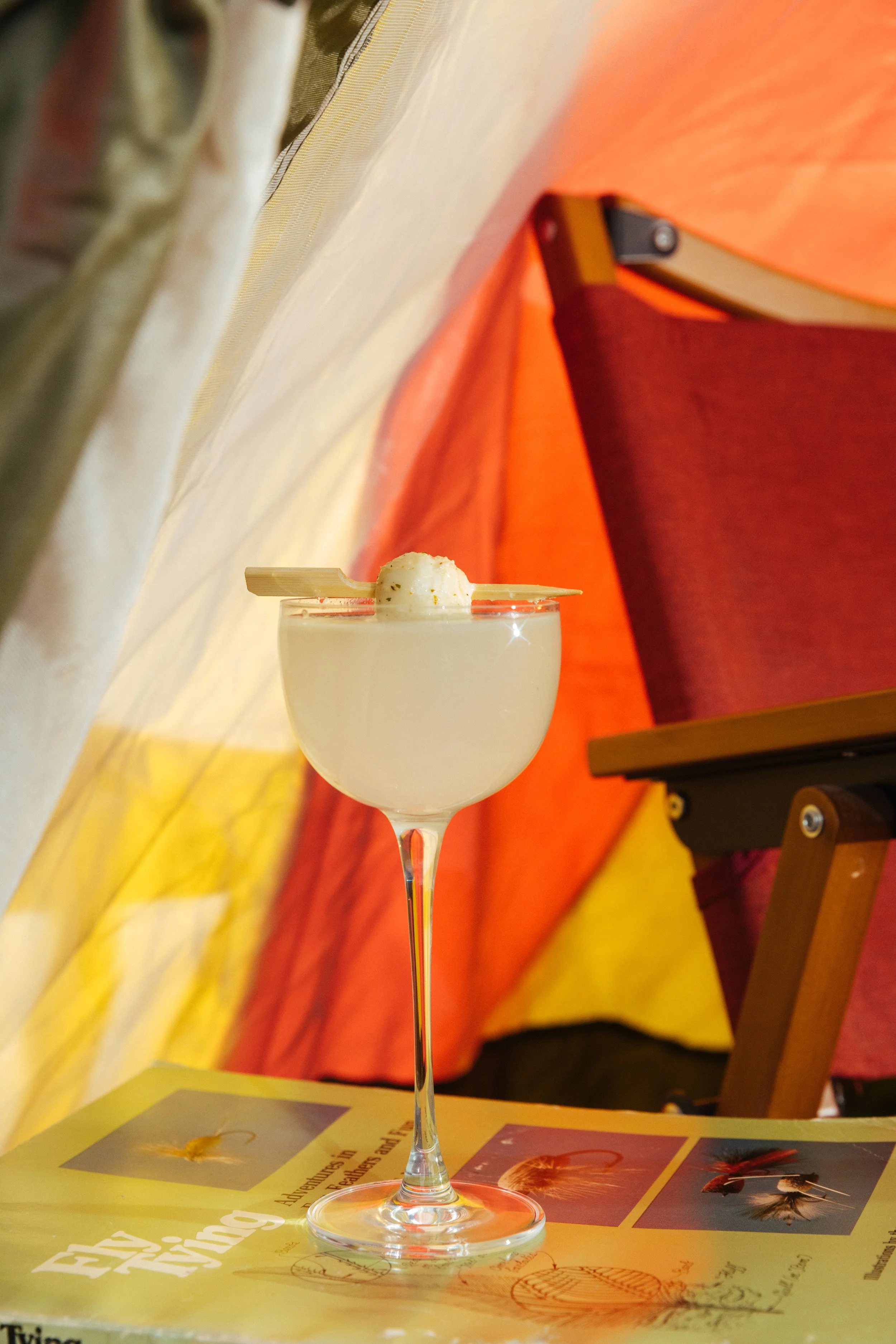 Javelin — Olive oil-washed tomato gin, basil eau de vie, lemon and saline with marinated mozzarella.