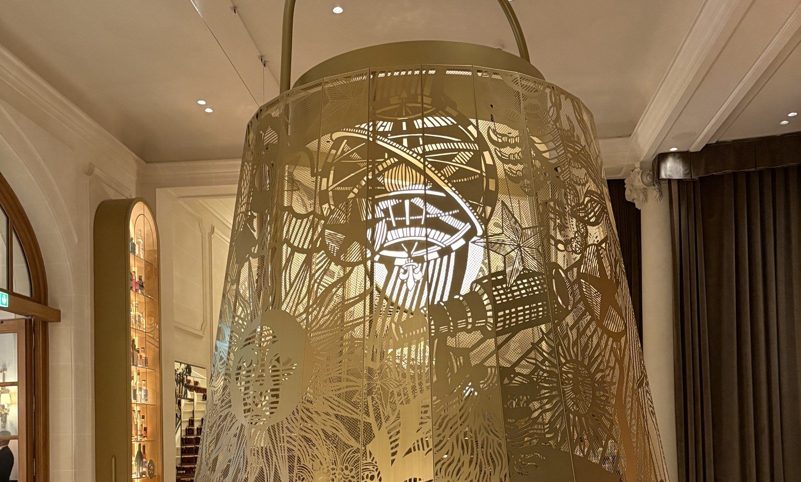 The gilded cage canopy above the bar at the Ritz Paris