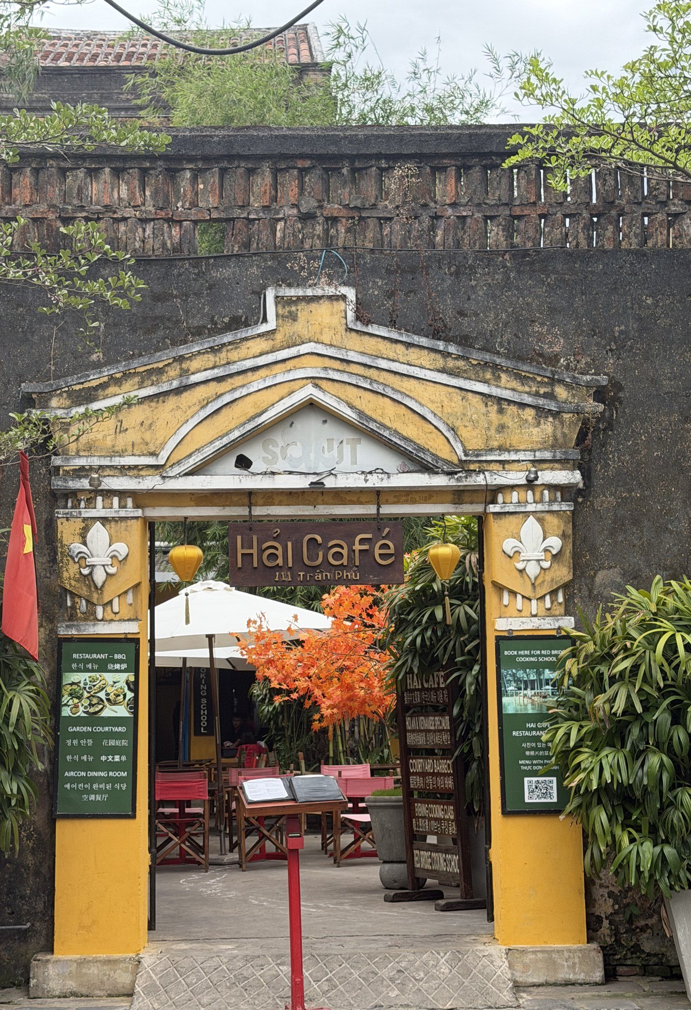 The ochre gateway to Hai Cafe in the old town at Hoi An, Vietnam