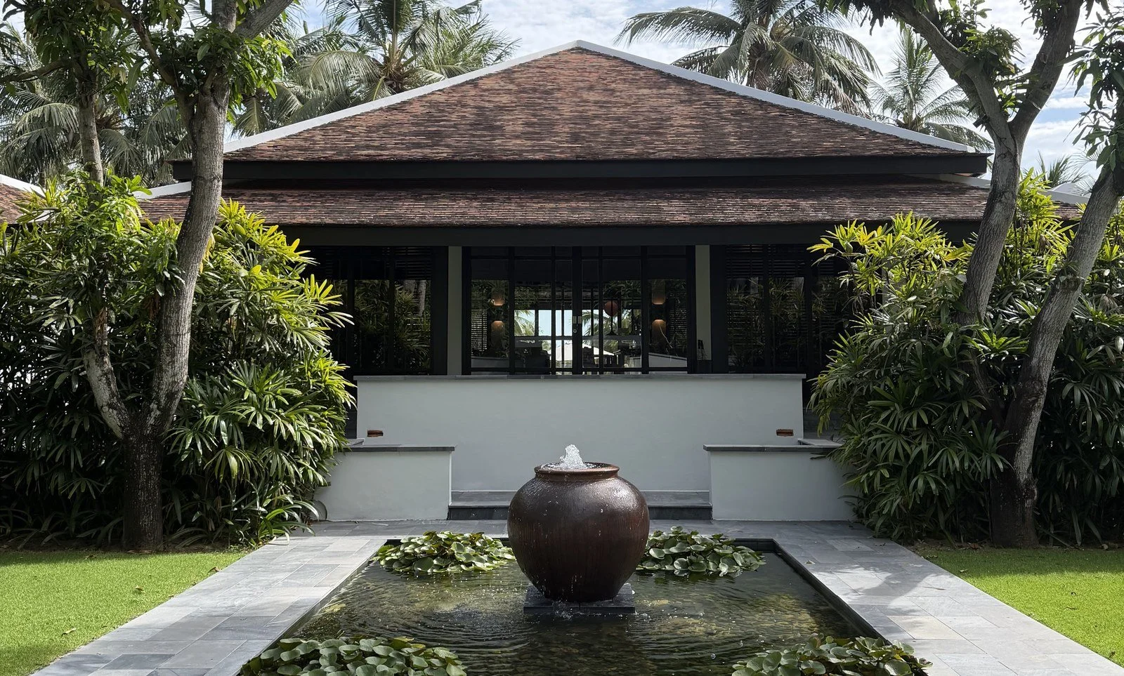 Garden pavilion and reflecting pool at Four Seasons Resort The Nam Hai in Hoi An, Vietnam