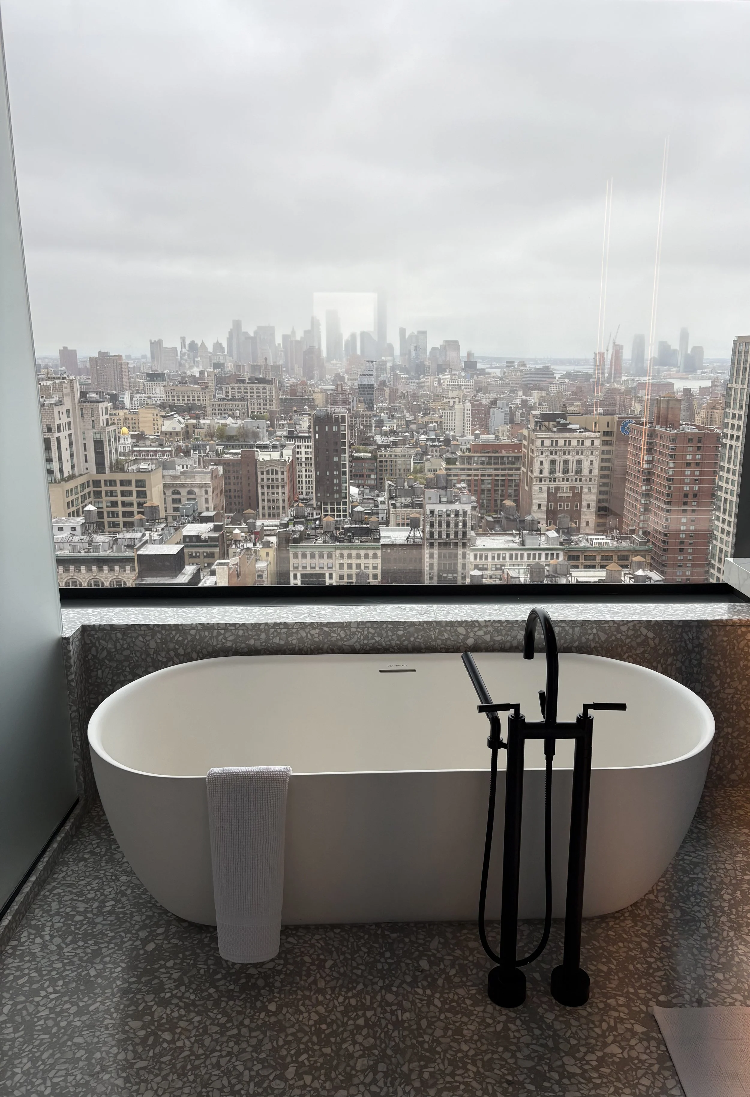 Freestanding tub overlooking the Manhattan skyline at the Ritz-Carlton New York, NoMad