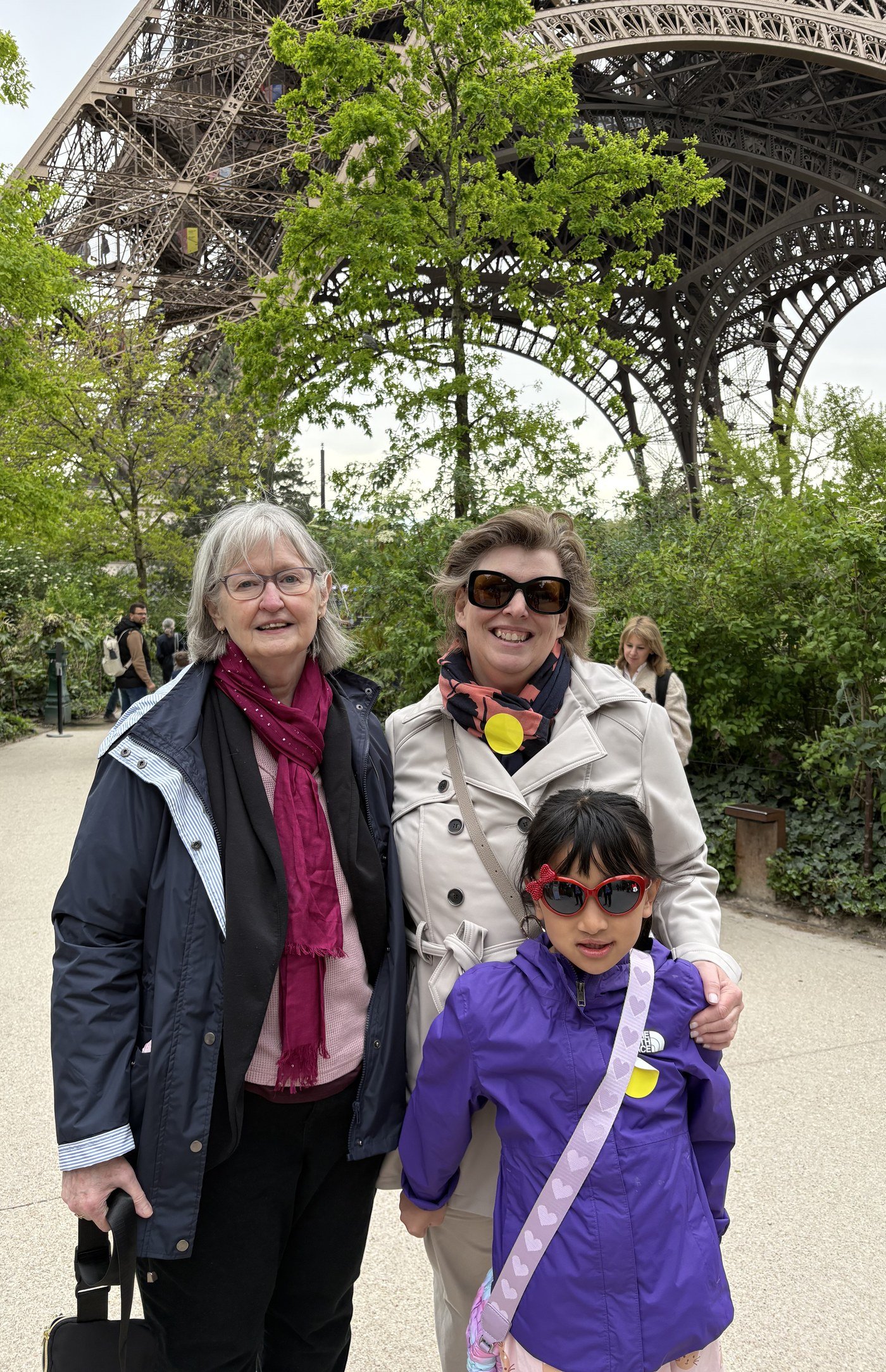 Three generations of my family under the Eiffel Tower in Paris