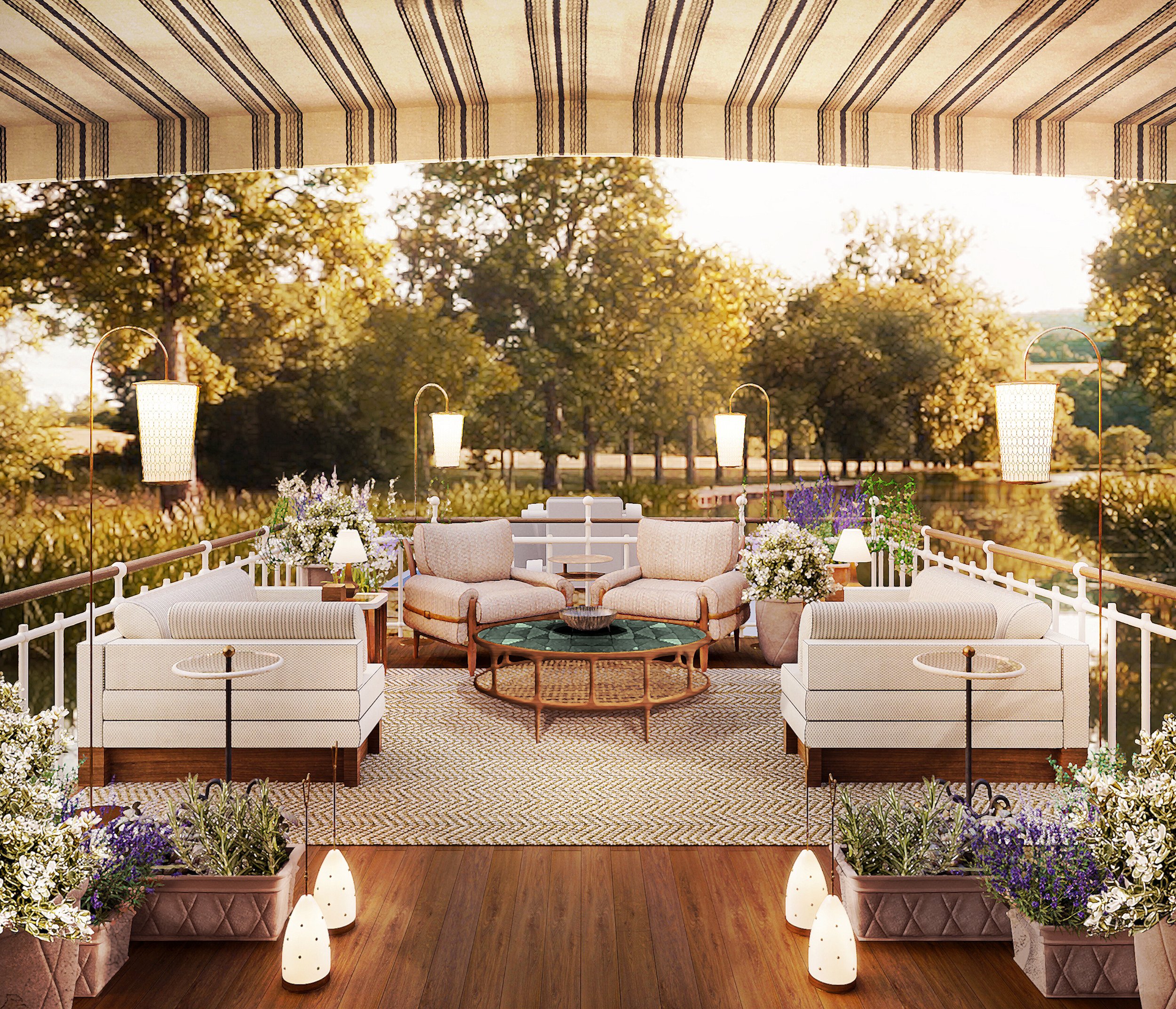 A cozy outdoor patio on a luxury river boat with sofas, armchairs, and tables, decorated with flowers and lamps, overlooking a green park with trees at sunset.