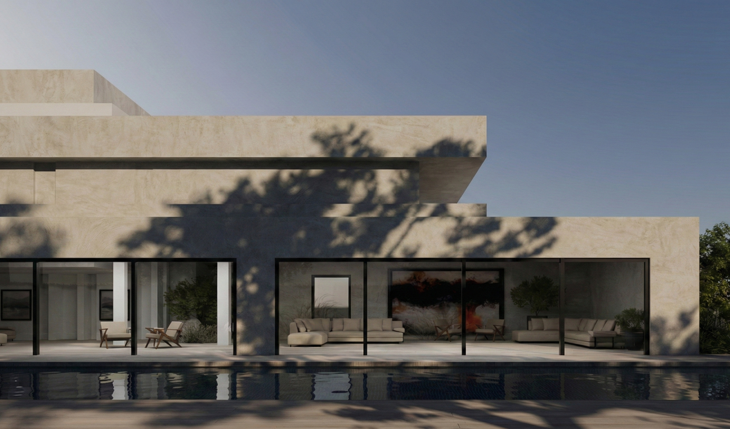 Stone Creek House: Modern house with large glass windows and outdoor seating area, reflecting in a swimming pool, with shadows of trees on the facade.