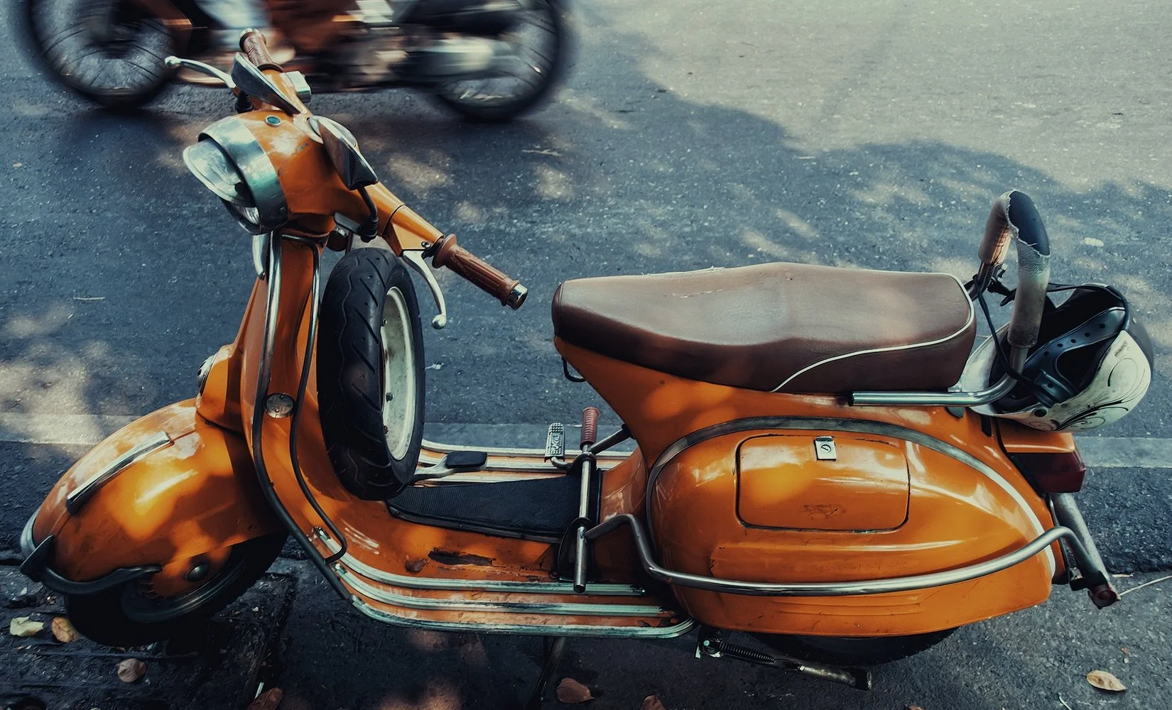 One of thousands of scooters in Bangkok, Thailand