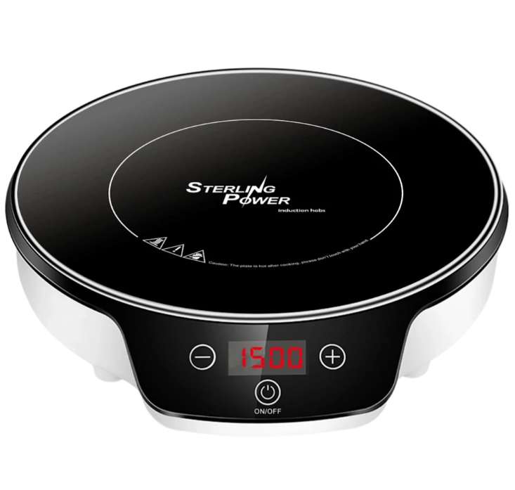 Electric induction cooker with digital display showing 1500 watts.