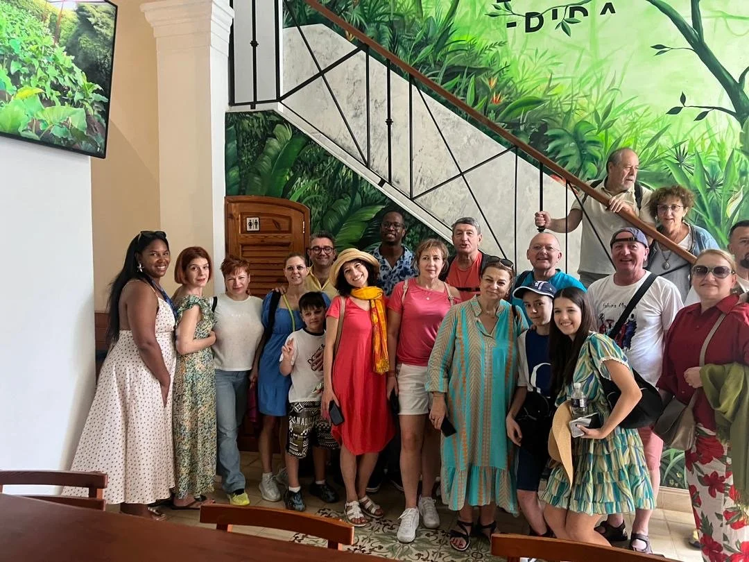 Dayron Robles hosts visitors to his restaurant in Cuba