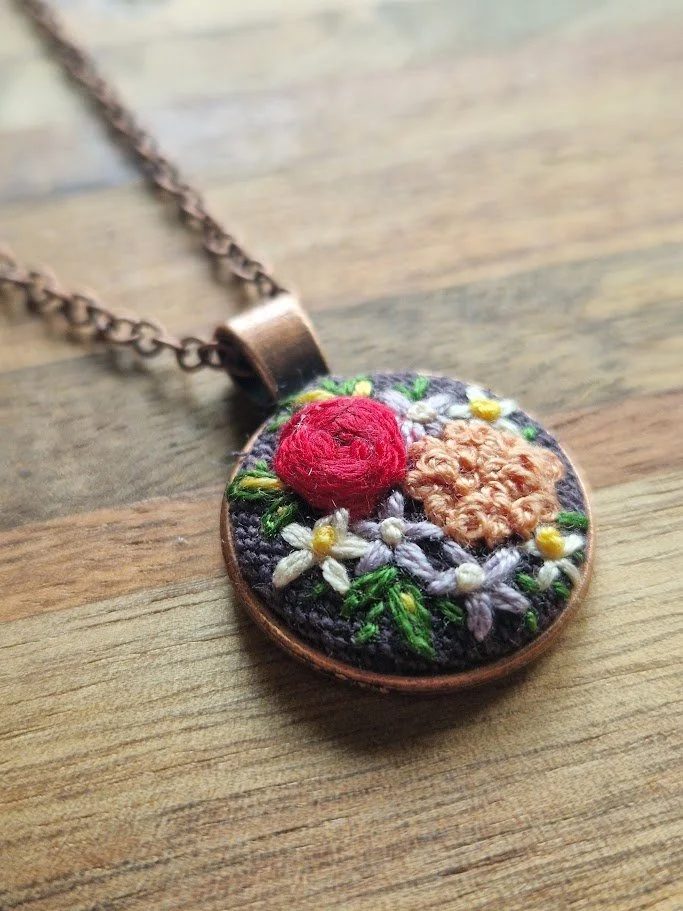 Floral Elegance Hand-Embroidered Copper Pendant