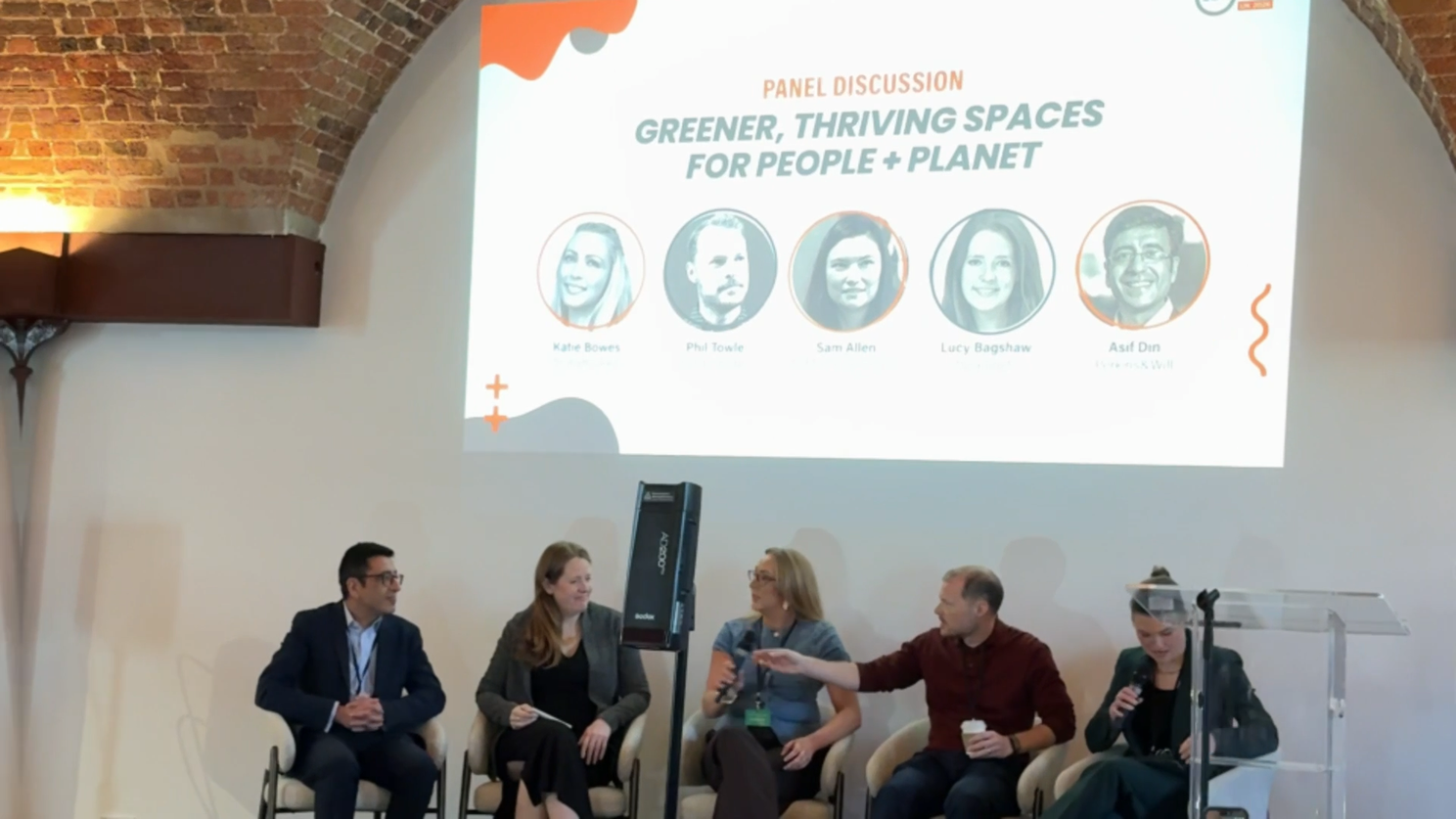 Panel discussion on greener thriving spaces for people and  planet at a sustainable design event in London, featuring  speakers Kate Bowes, Phil Towle, Sam Allen, Lucy Bagshaw,  and Asif Din
