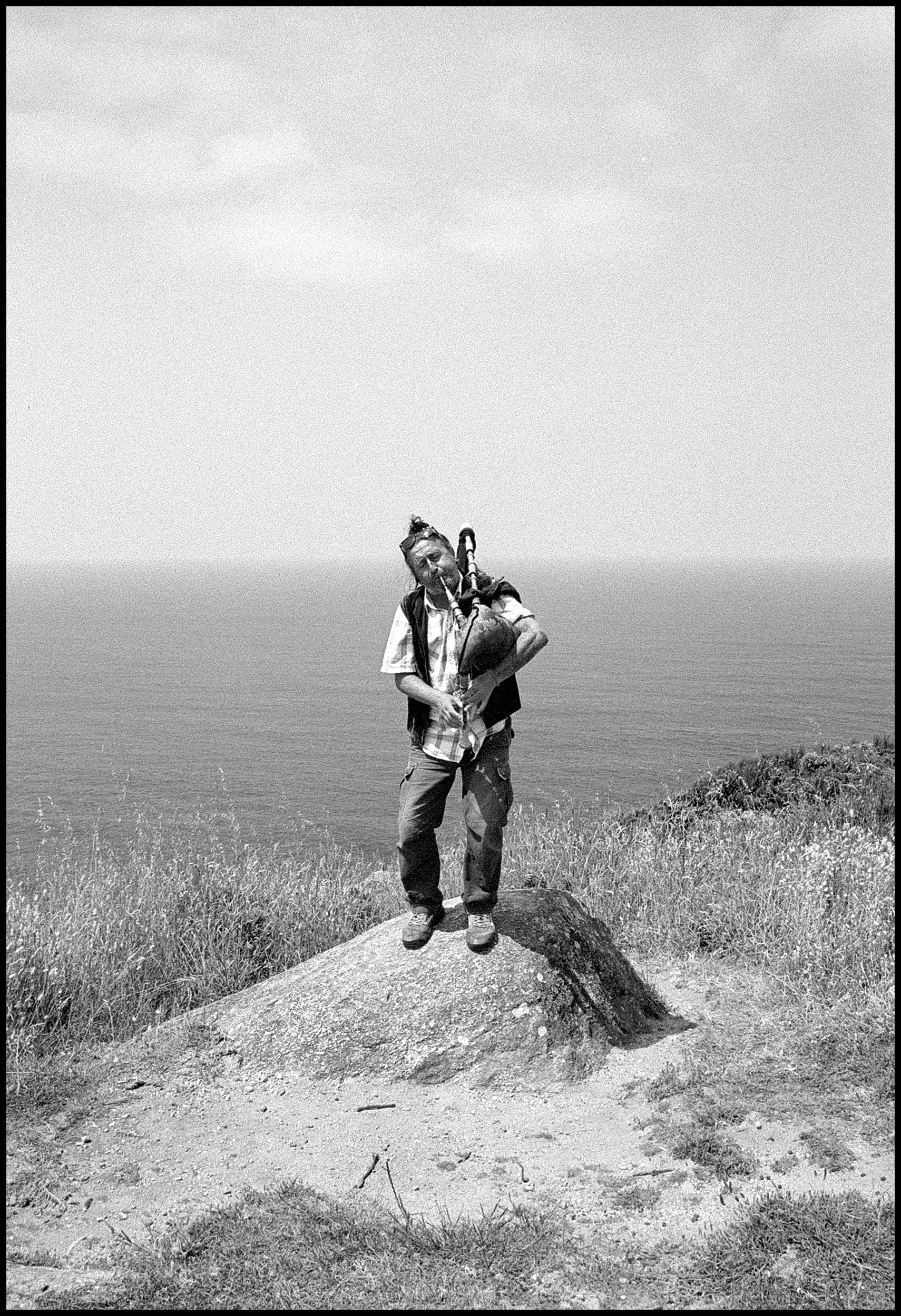 Galician artist plays the bagpipes, a typical Galician instrument. Galiza, Spain. 2025.