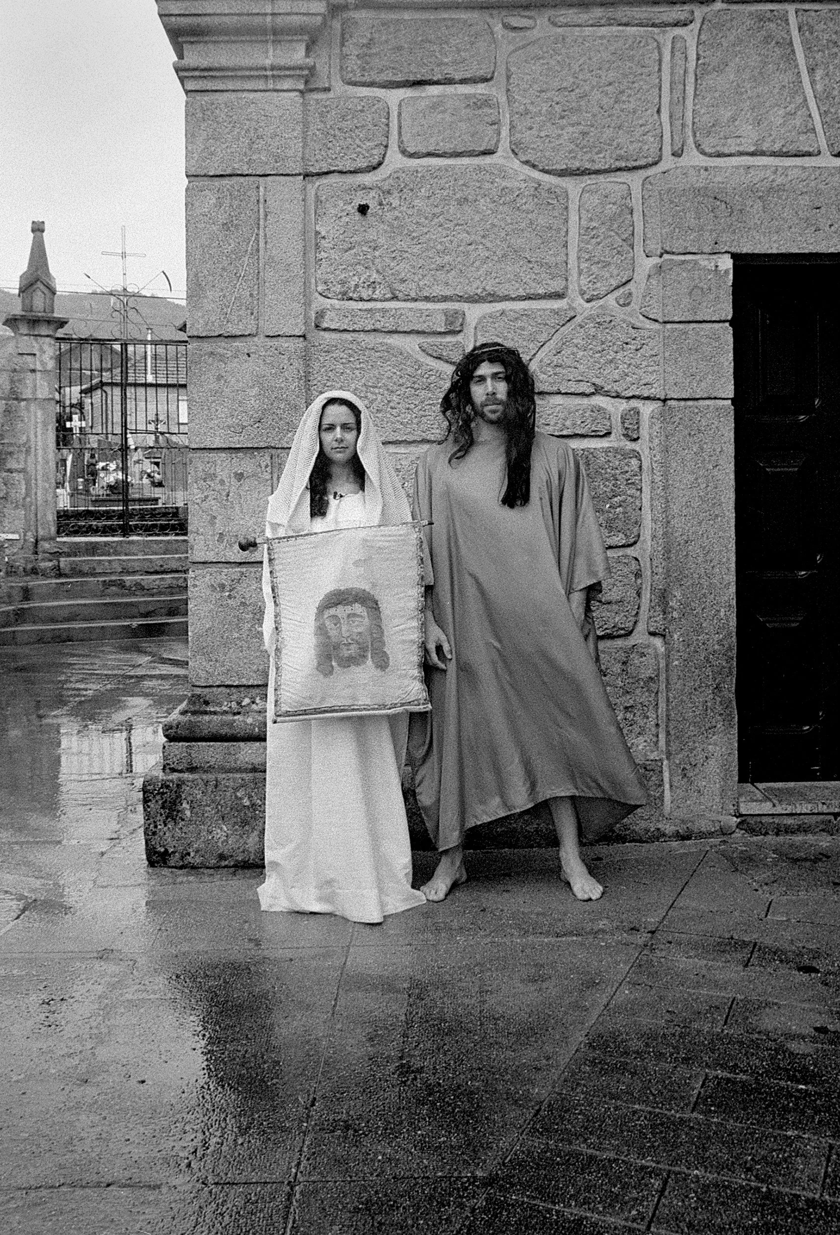 Two people reenacting a scene from the Passion of Christ. Viana do Castelo, Portugal. 2025.
