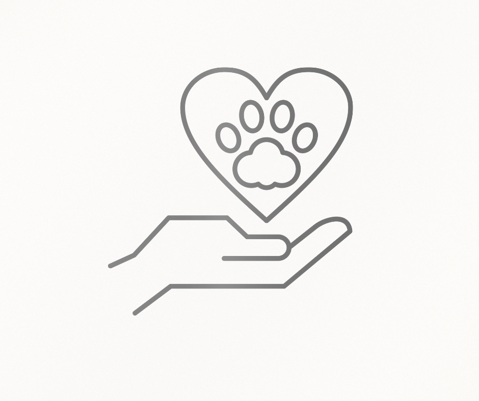 Human hand with an animal paw above it. Animal paw is surrounded by a heart, symbolizing love for animals.