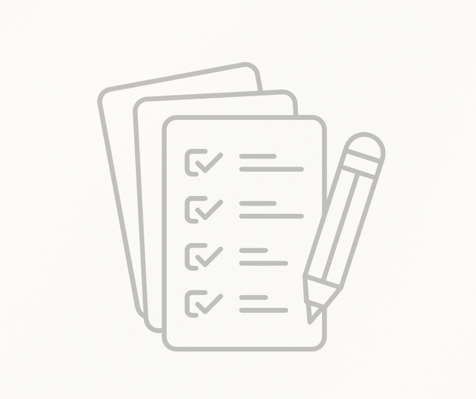 A checklist with a pen, showing three checked items on a notepad.