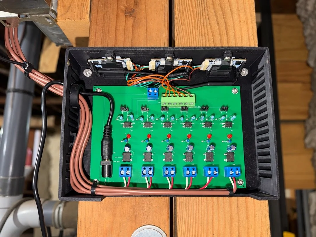 A personal project evolving from Rev 0&mdash;the original assembled prototype&mdash;to the more compact/refined Rev 1 design shown in the Solidworks visuals. The six-channel board uses optical isolation to safely detect each thermostat heat call and 