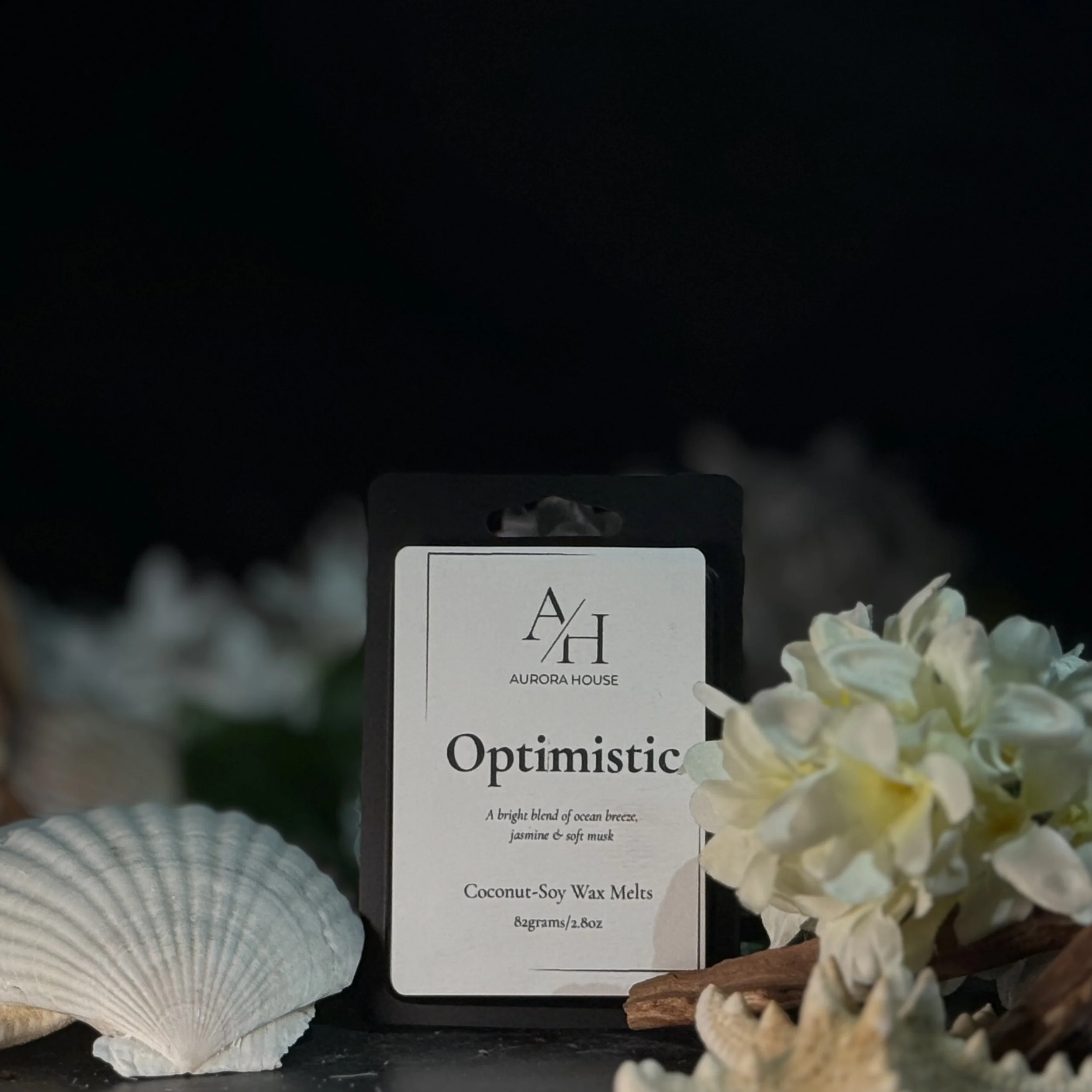 Aurora House wax melts Optimistic with starfish and shells and jasmine sprigs