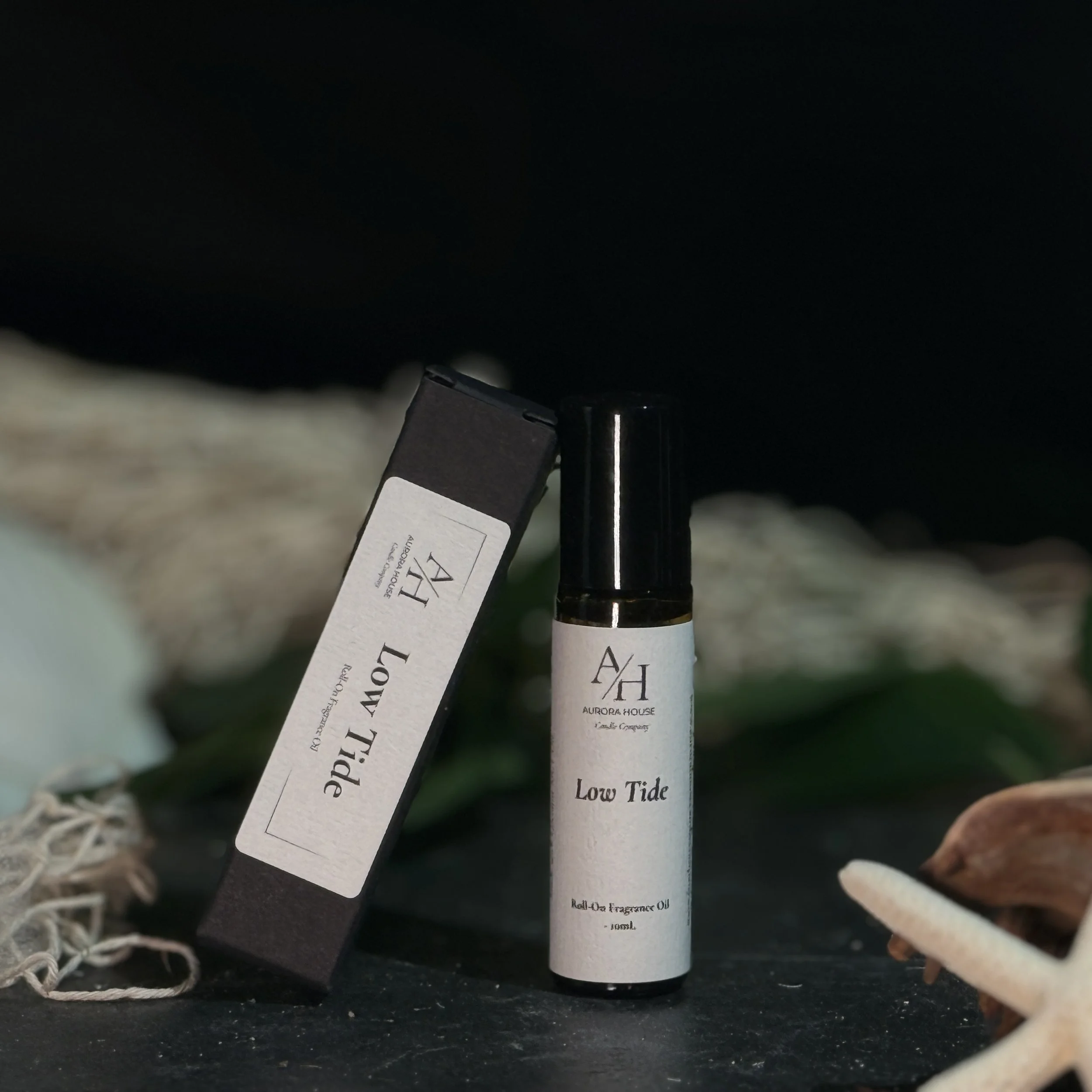 Aurora House Fragrance Oil Roller Low Tide with starfish and shells