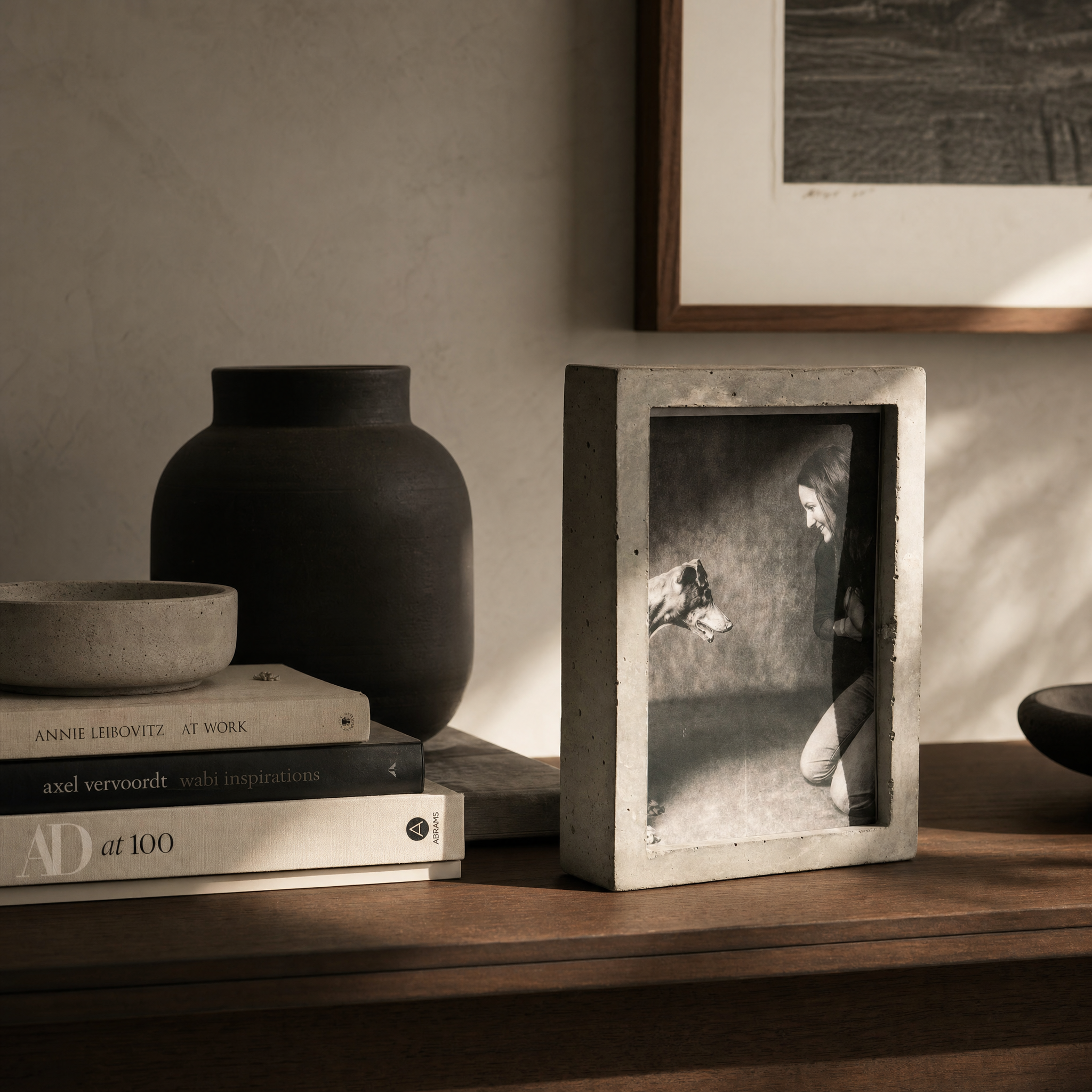 Aurora House Vista Frame styled on a modern shelf with warm ambient lighting and minimalist decor.