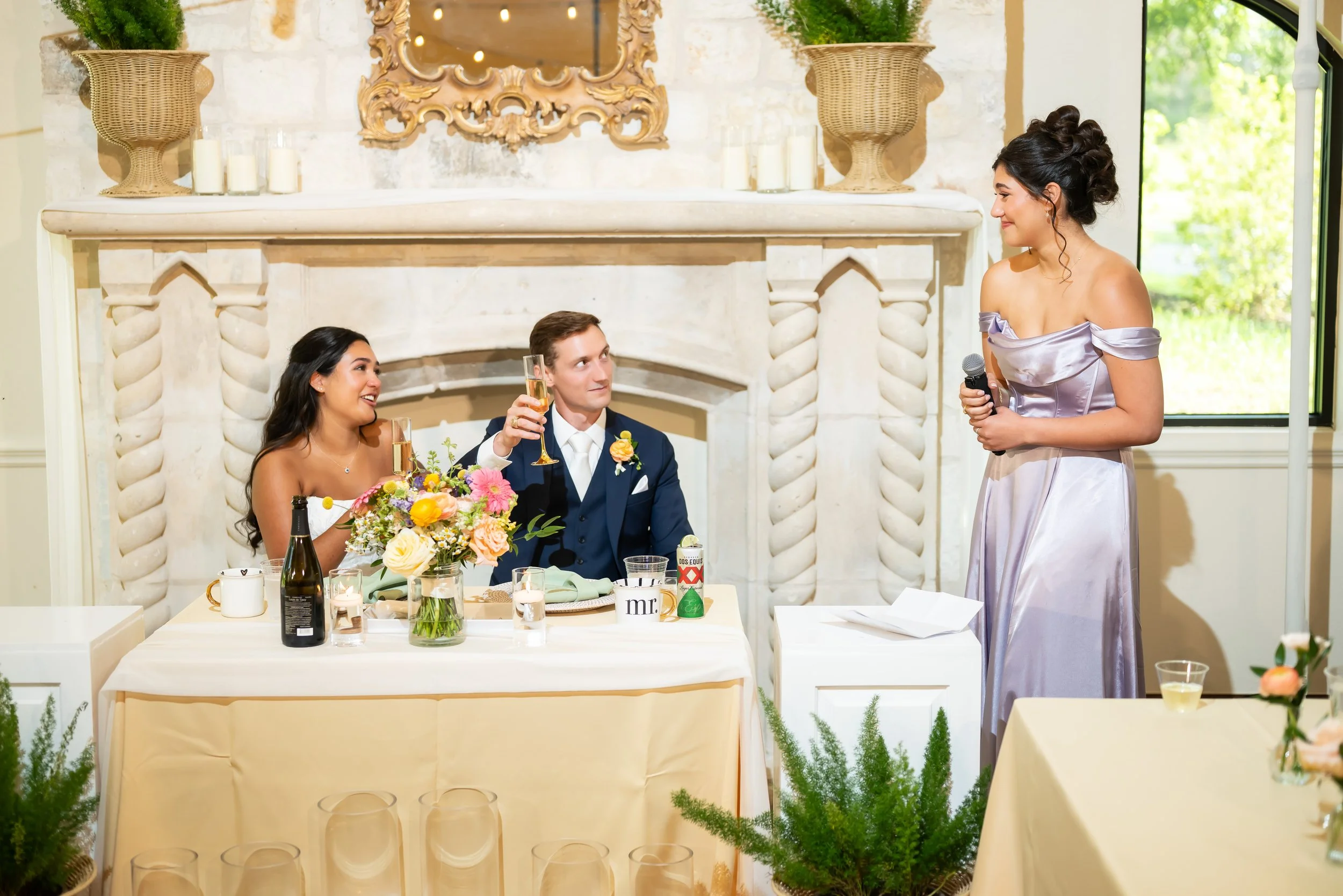 Bride and Groom during MOH Toast.jpg