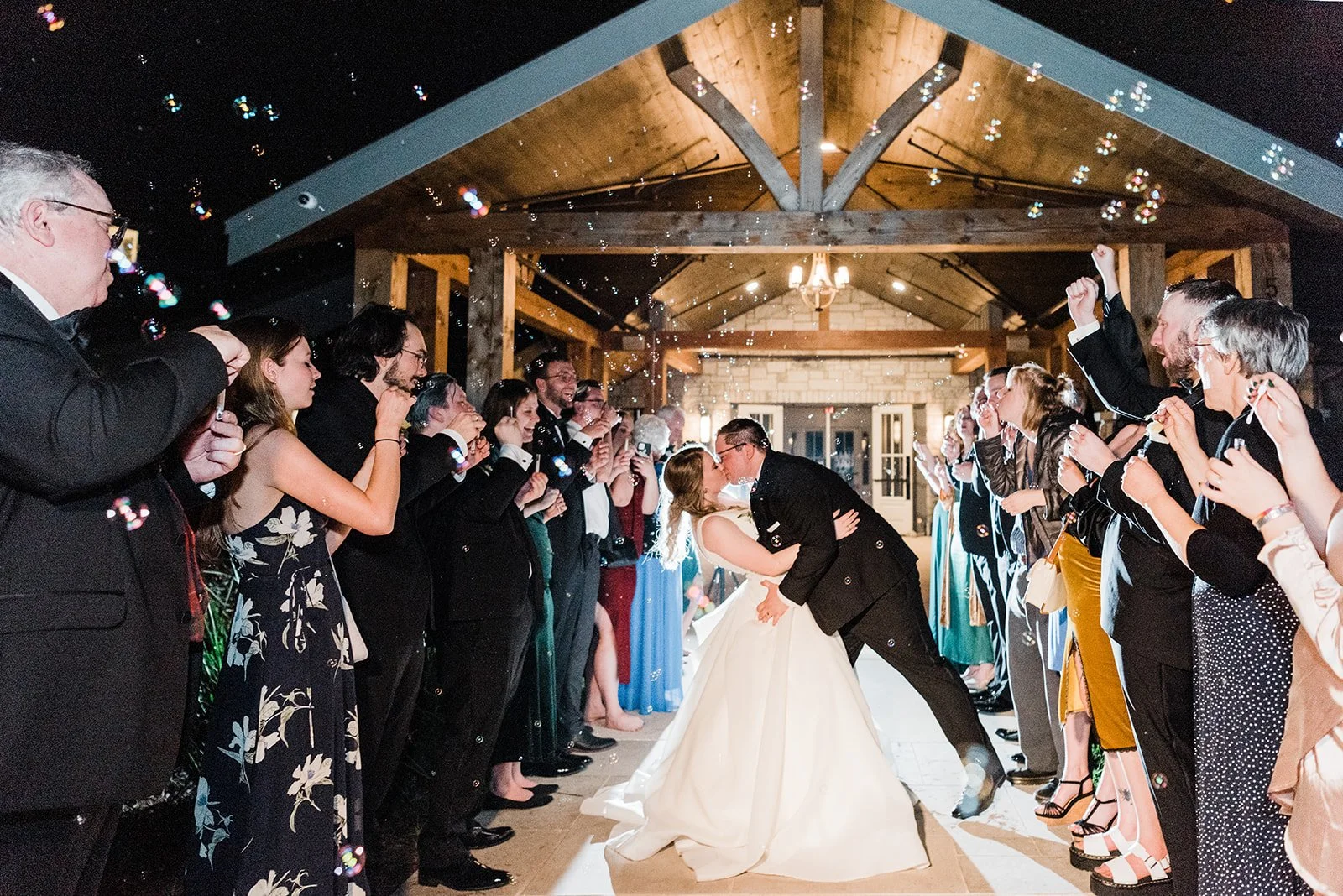 Bride and Groom Grand exit with bubbles at HighPointe Estate in Georgetown Texas