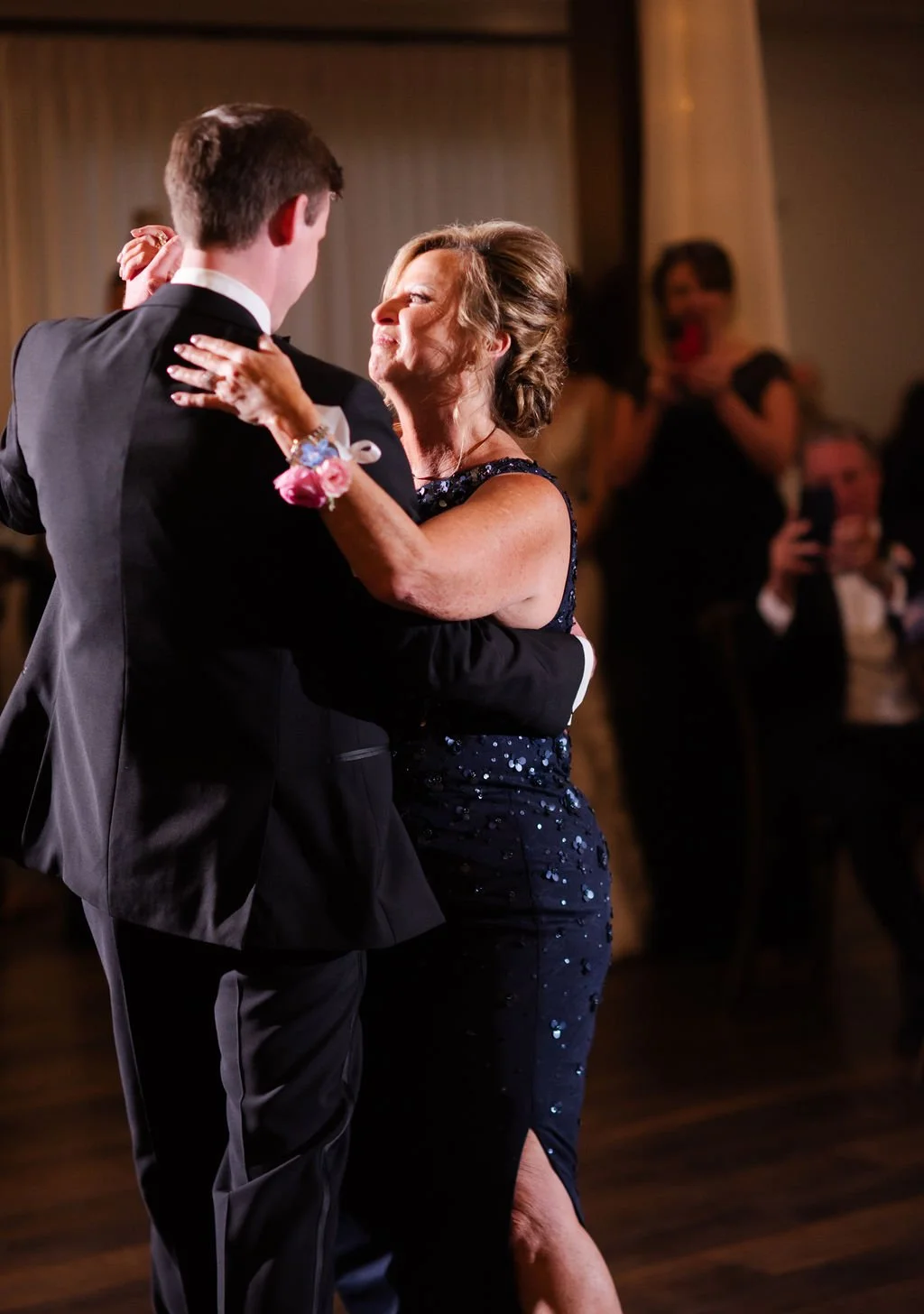 Groom and his mother dancing during Mother son dance at HighPointe Estate