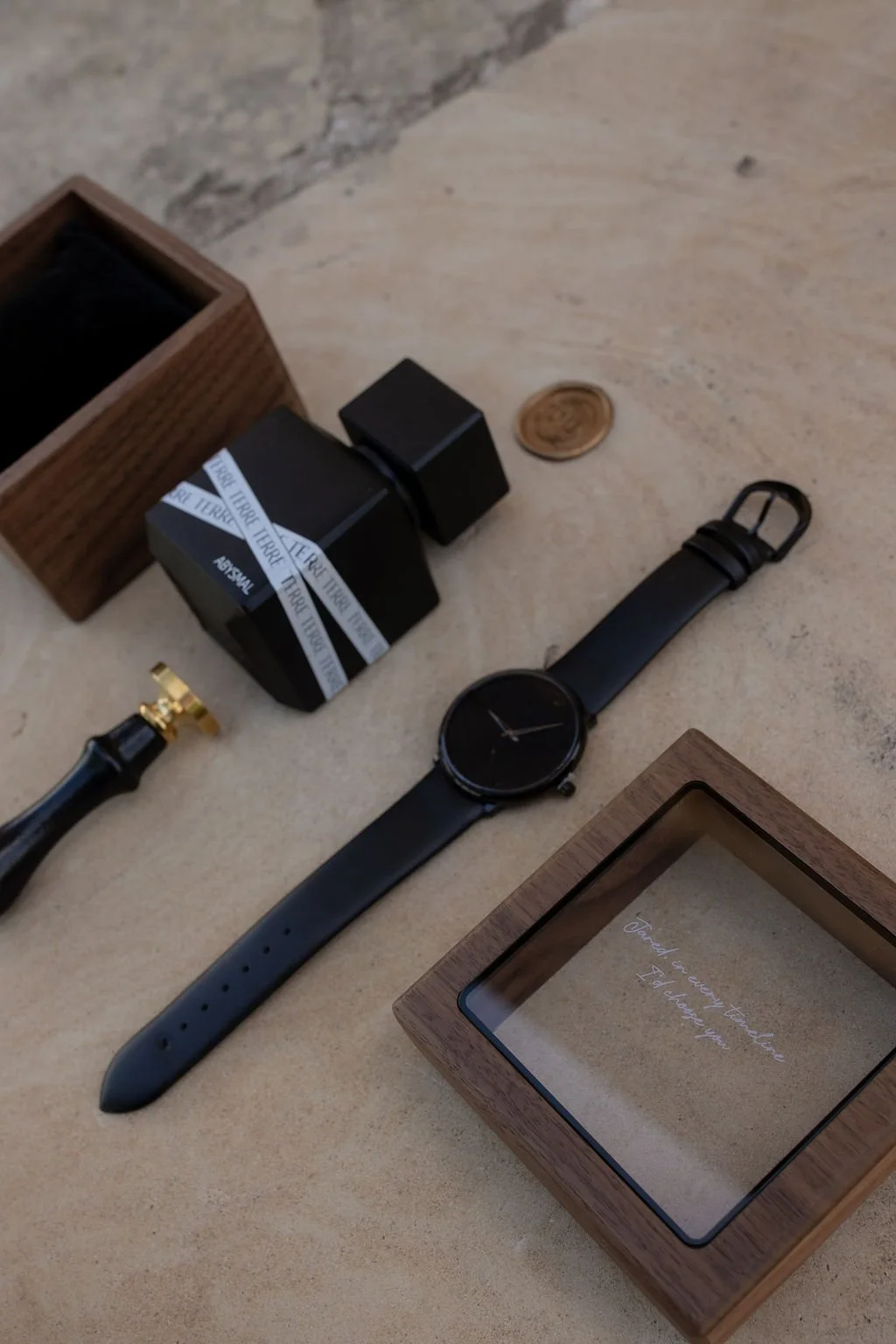 Grooms details photos with a watch, cologne, and wax seal