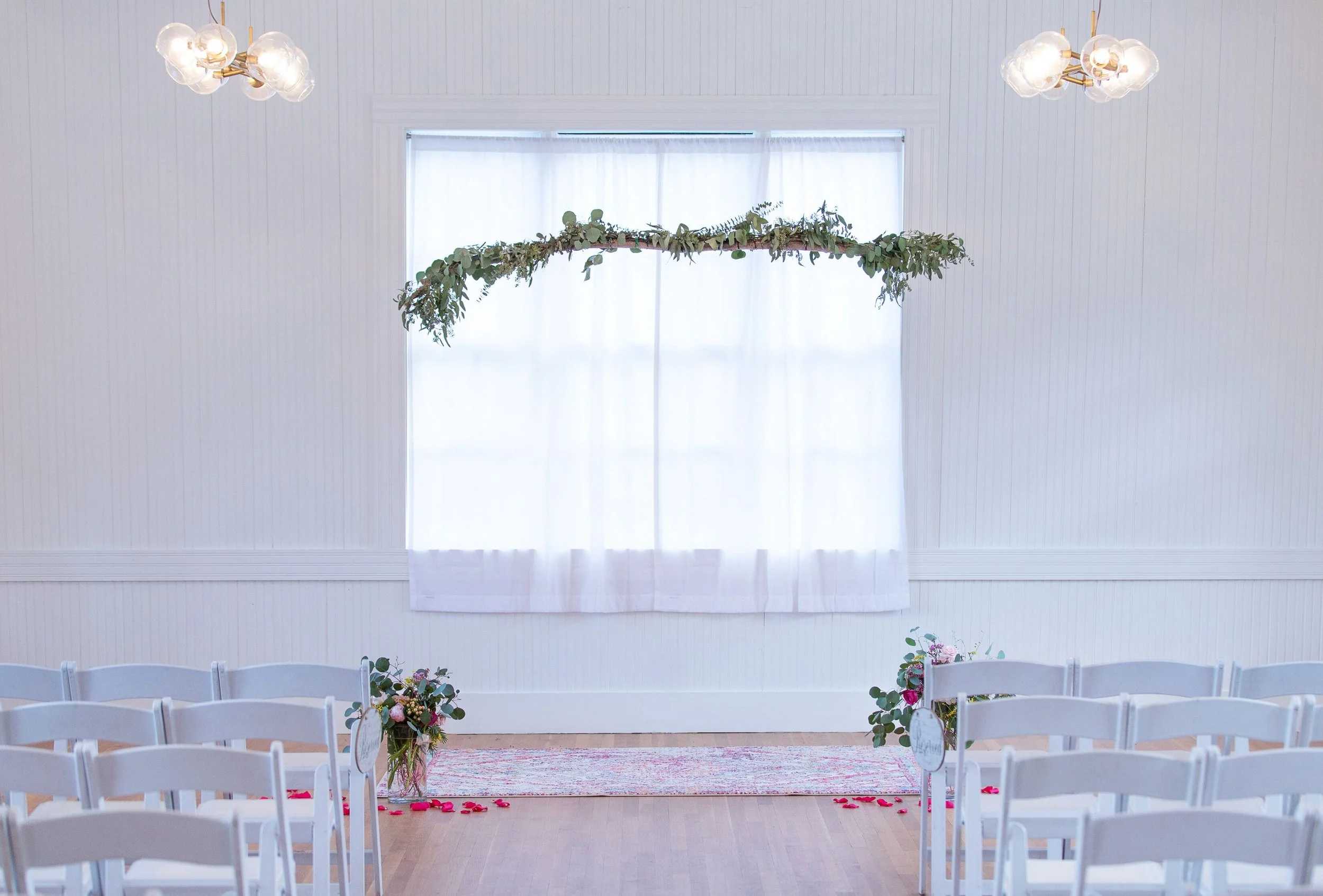 Unique Free hanging branch over wedding ceremony alter space at Springdale Station in Austin Texas
