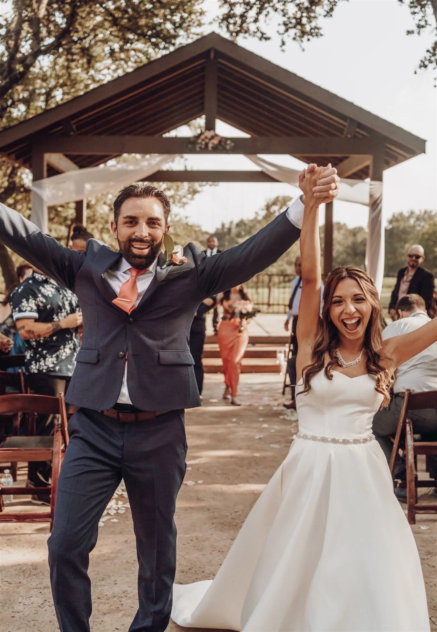 Couple Celebrating after they just got married at The Ranch Austin Wedding Venue 
