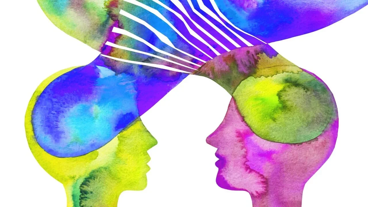 677ea9e534d33c38db4df0a2_graphic-showing-two-people-talking-and empathizing-with-each-other.webp