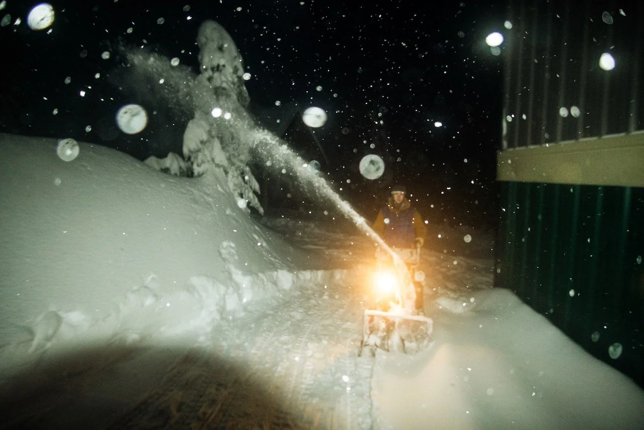 Snowblower working at Sol Mountain Lodge