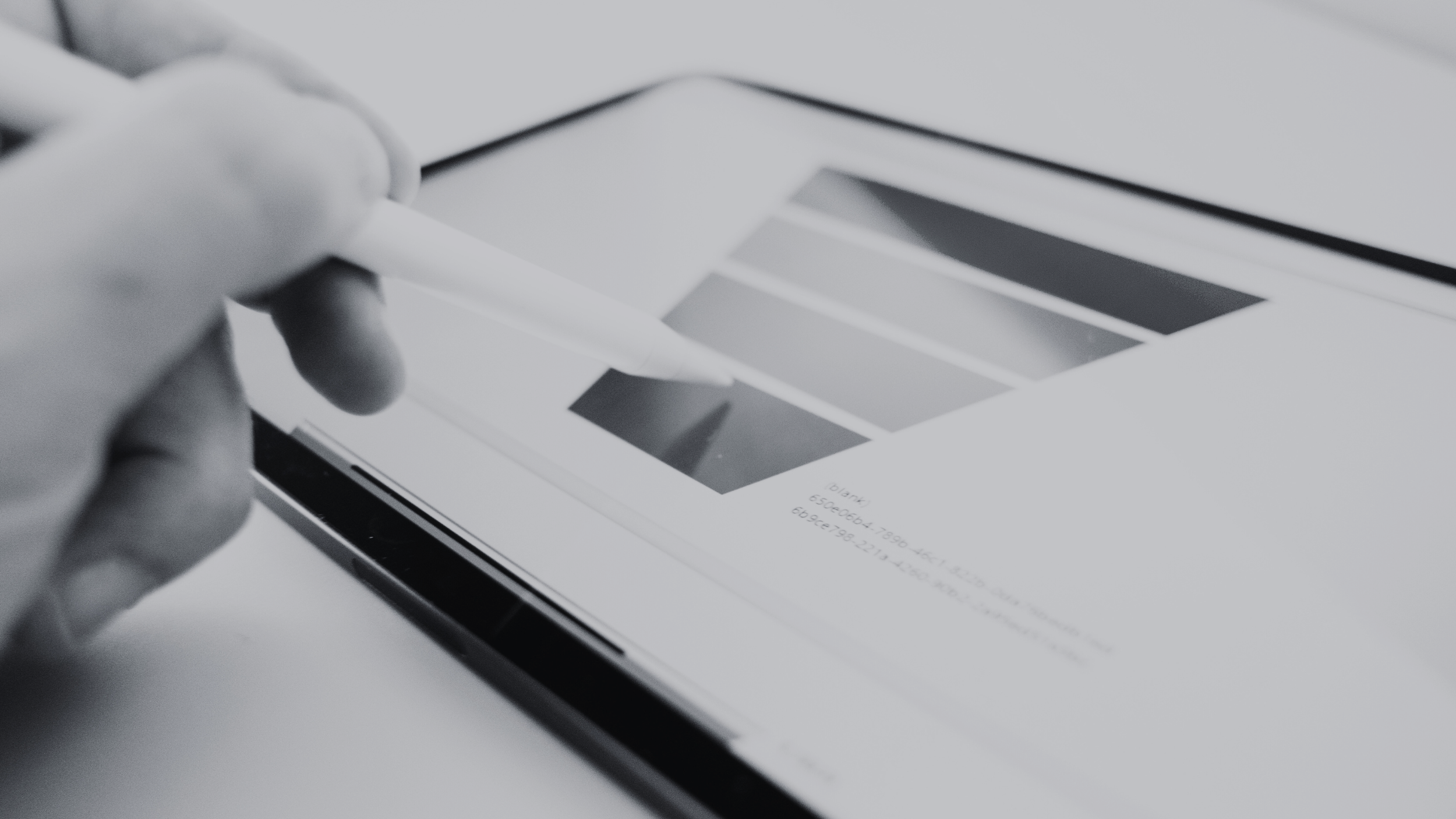 A person holding a stylus above a marketing funnel diagram on a digital tablet screen.