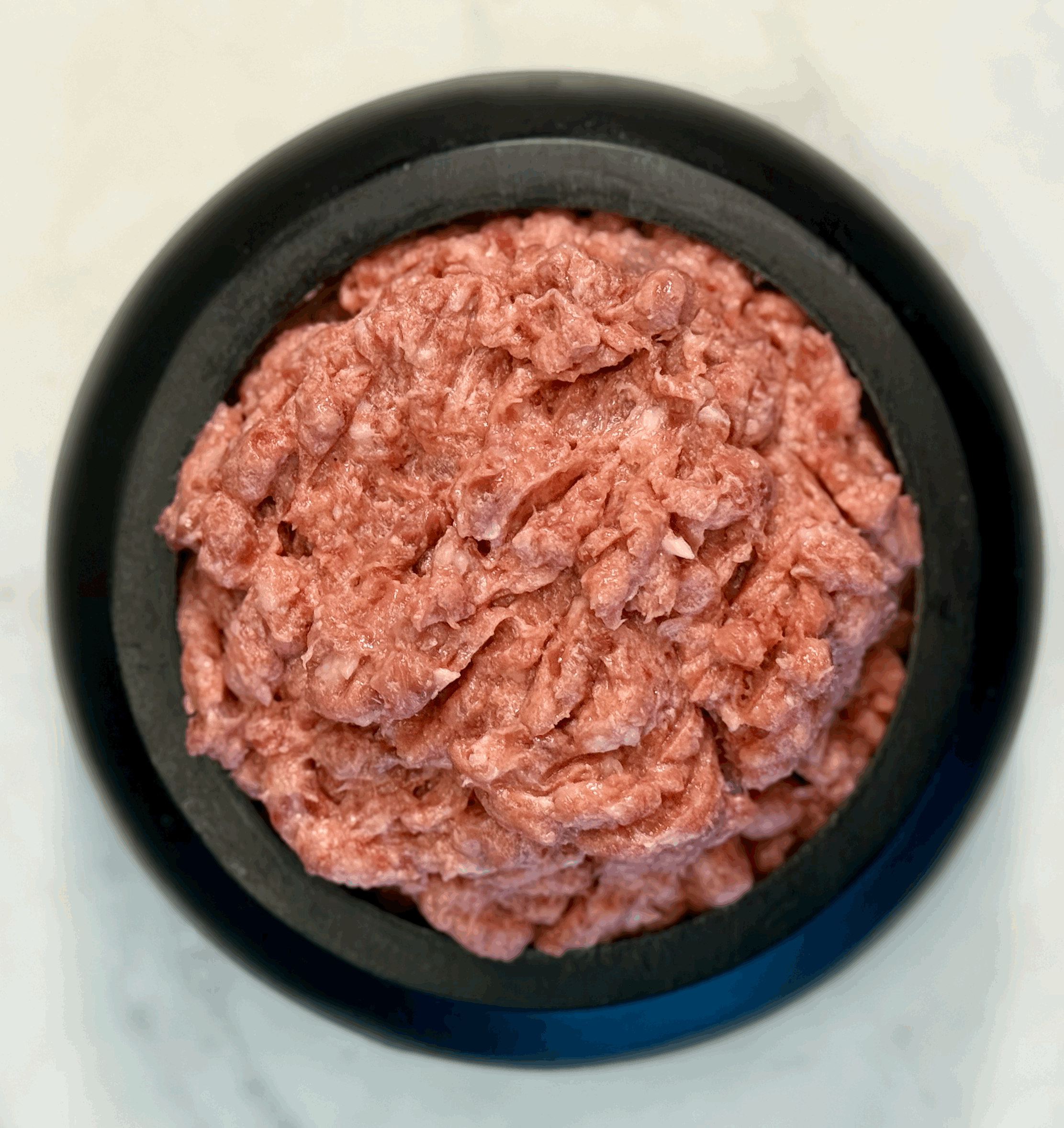 Close-up of Raw Goose Blend, highlighting rich, nourishing protein in a prey model raw diet.