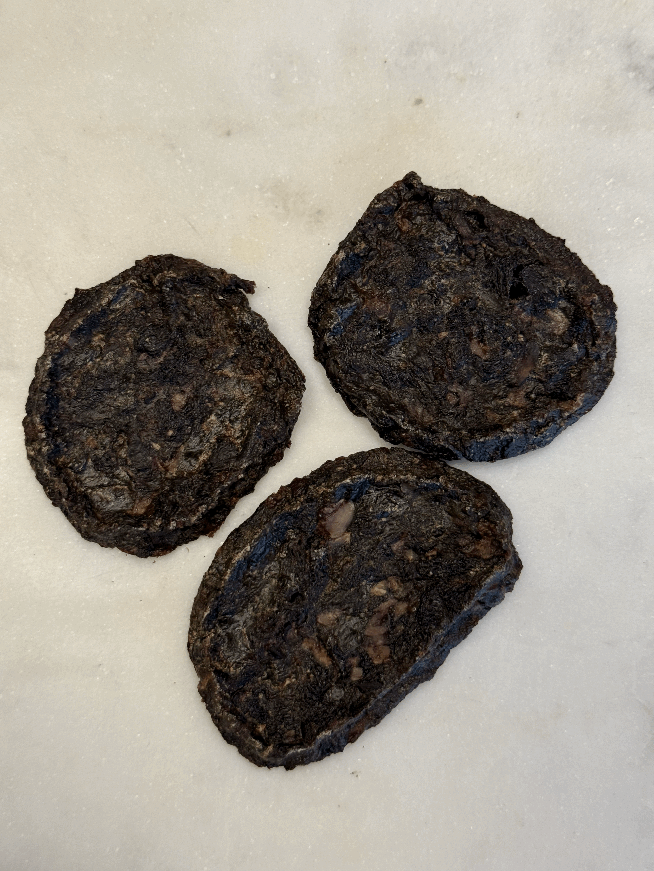 Single-ingredient Air-Dried grass-fed and finished lamb heart and liver treats for dogs and cats.
