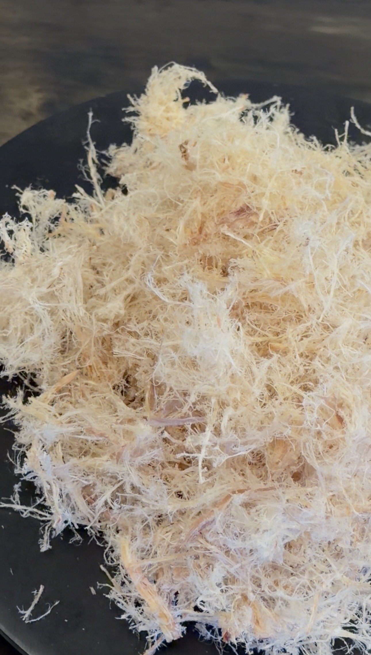 Dried emu dog treat made from collagen-rich connective tissue