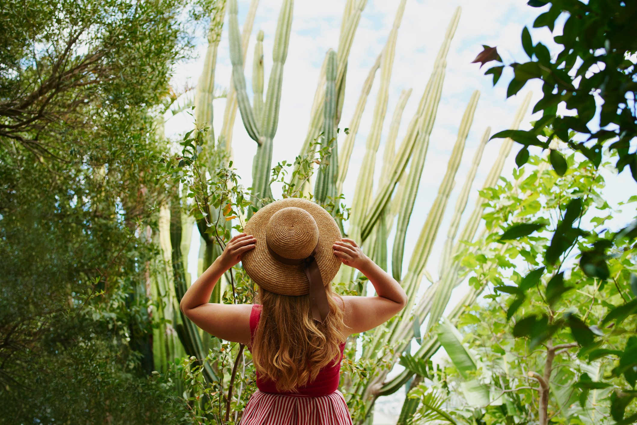 A woman thoughtfully reflecting, grounding herself and finding peace and calm after therapy session.