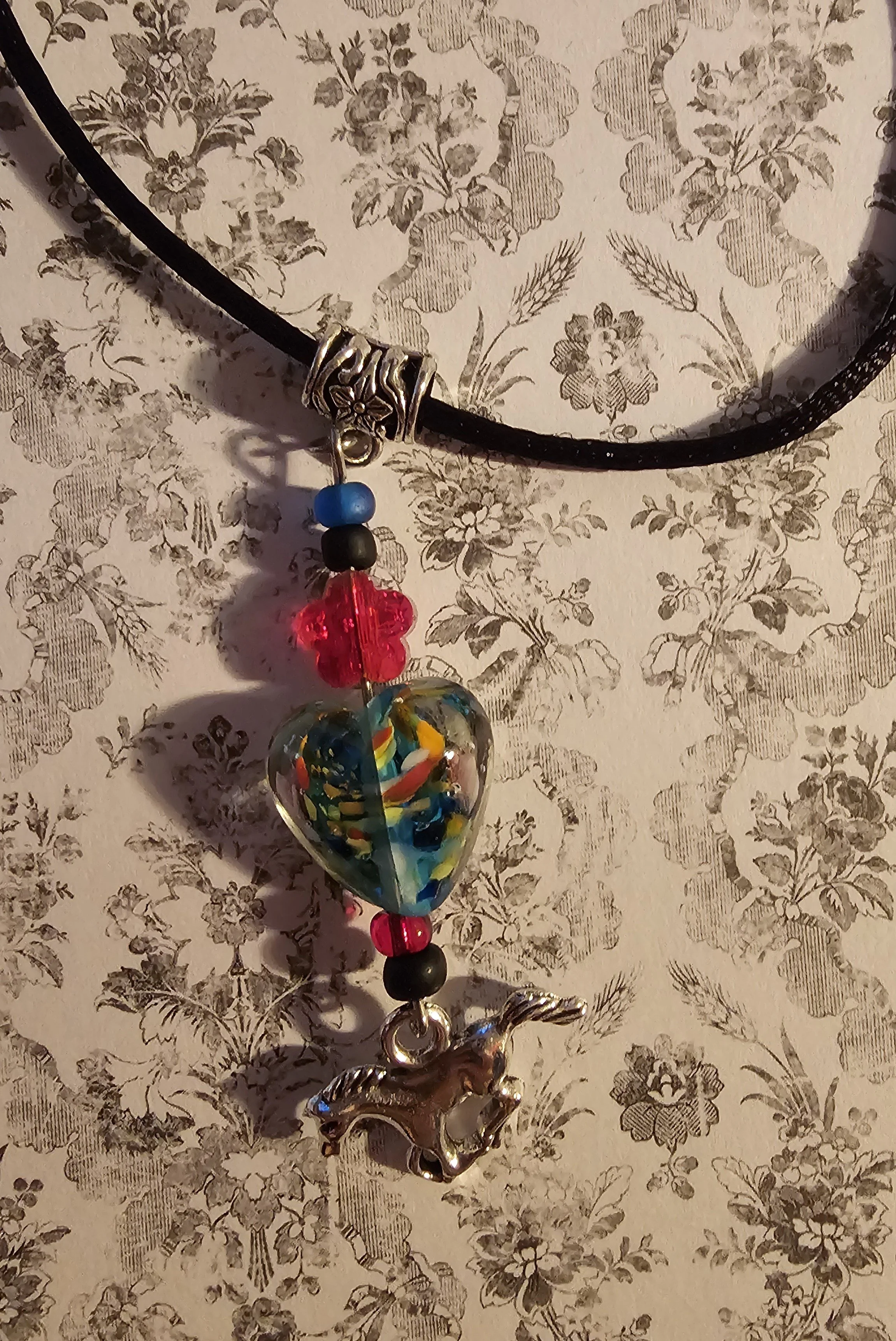BLUE RED GLASS HEART.jpg