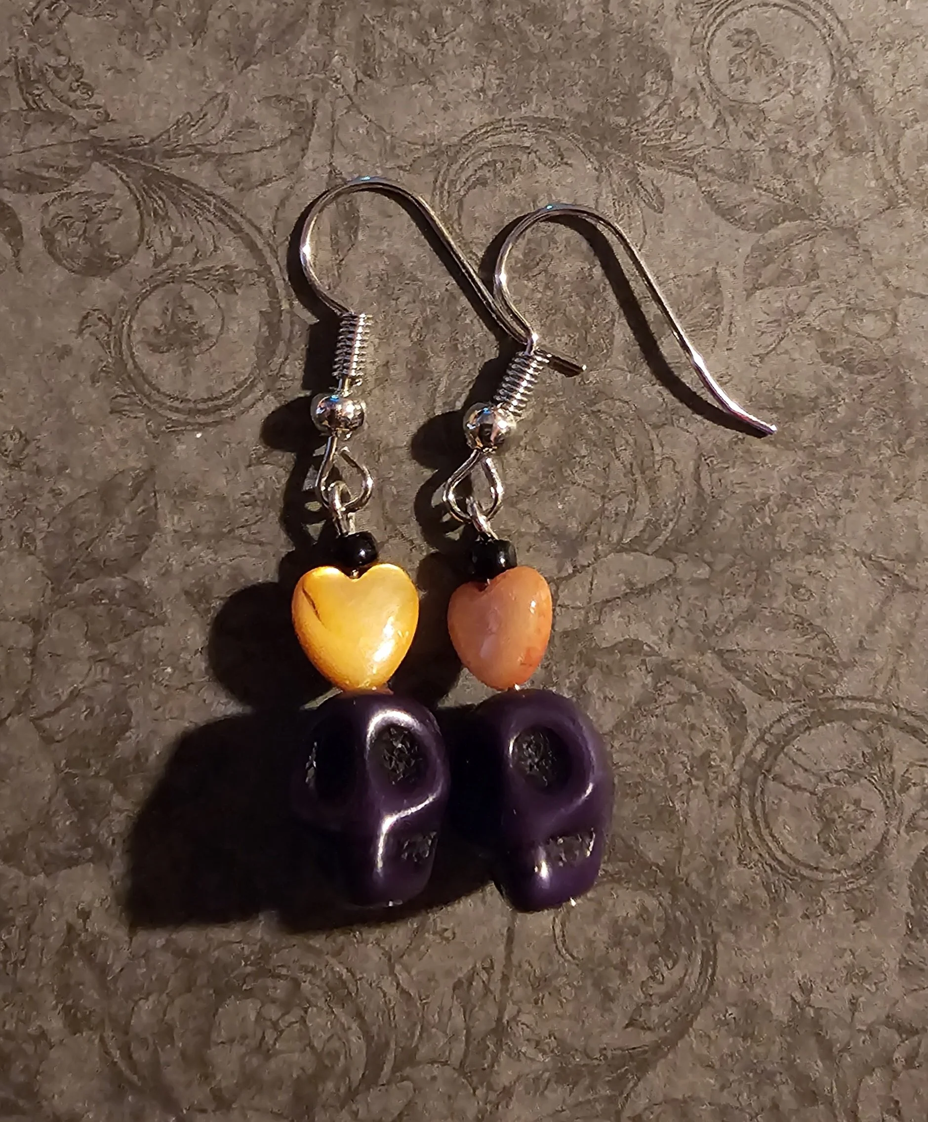 purple skull earrings.jpg