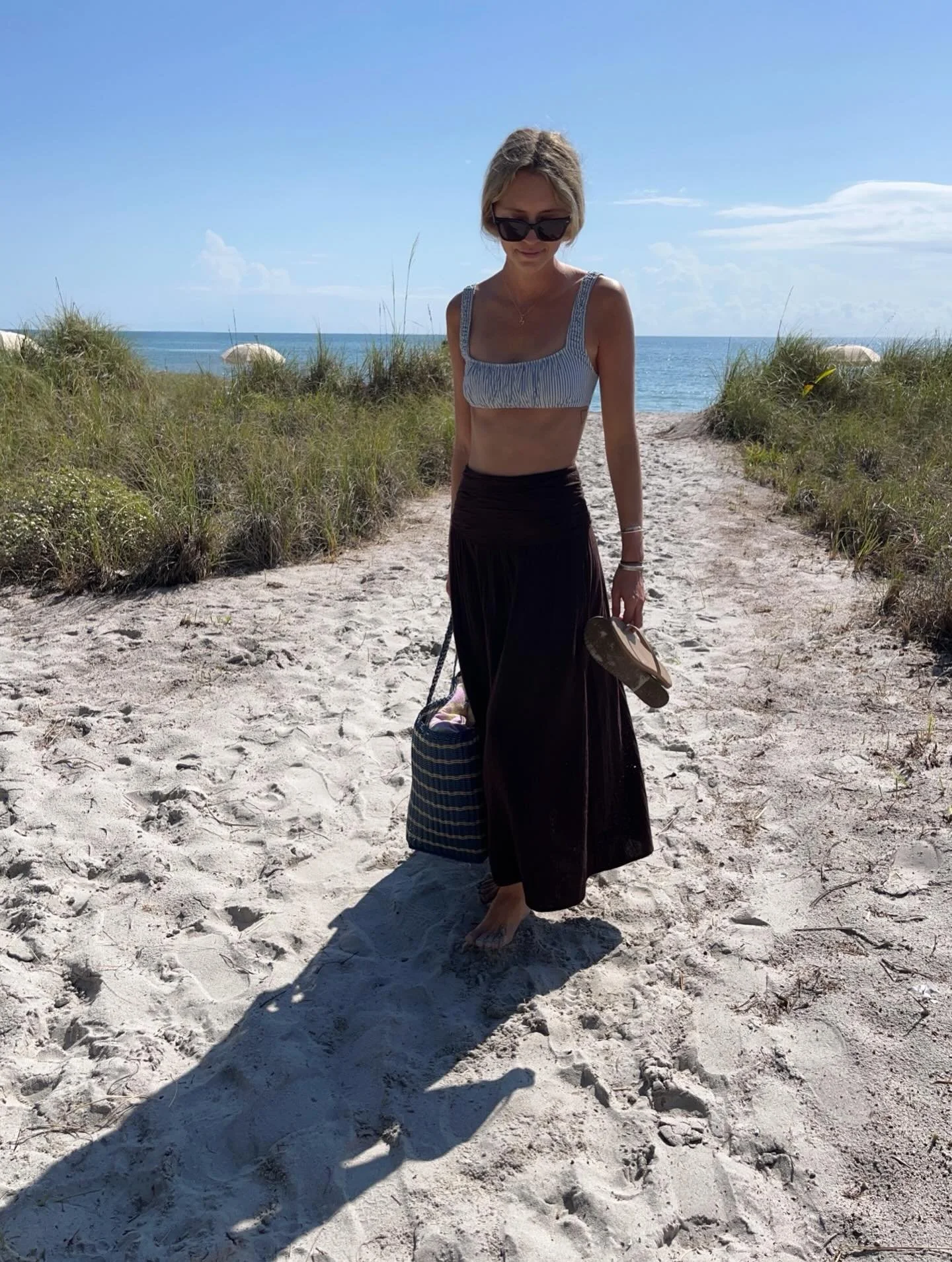 My latest skirt obsession 🤎 super soft gauzy material in the perfect chocolate brown shade and a true maxi length. I could go on&hellip; but just trust! Comment links to shop