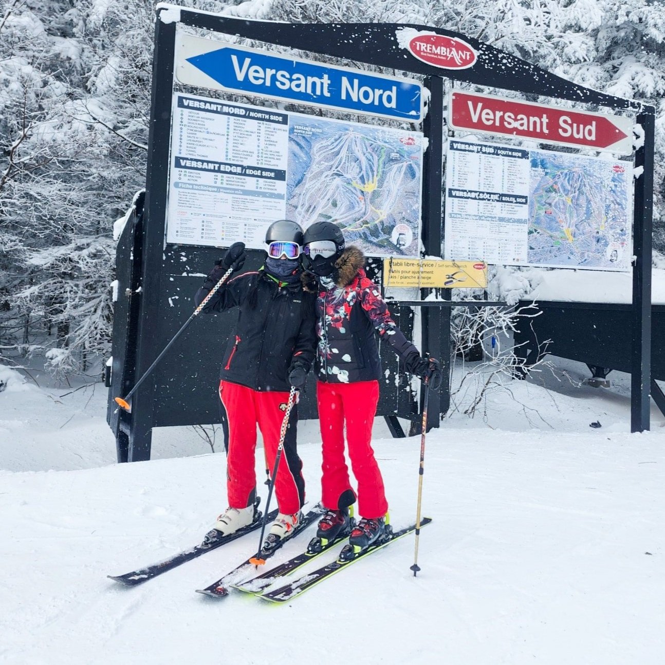 two-skiers-in-front-of-ski-map.jpg