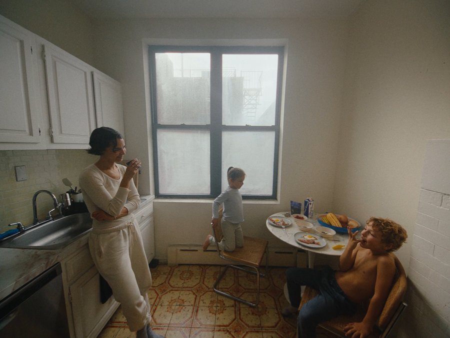 SHOT 25
Whole family in kitchen happy laughing.