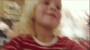 SHOT 14
Kids face on old DV camera.