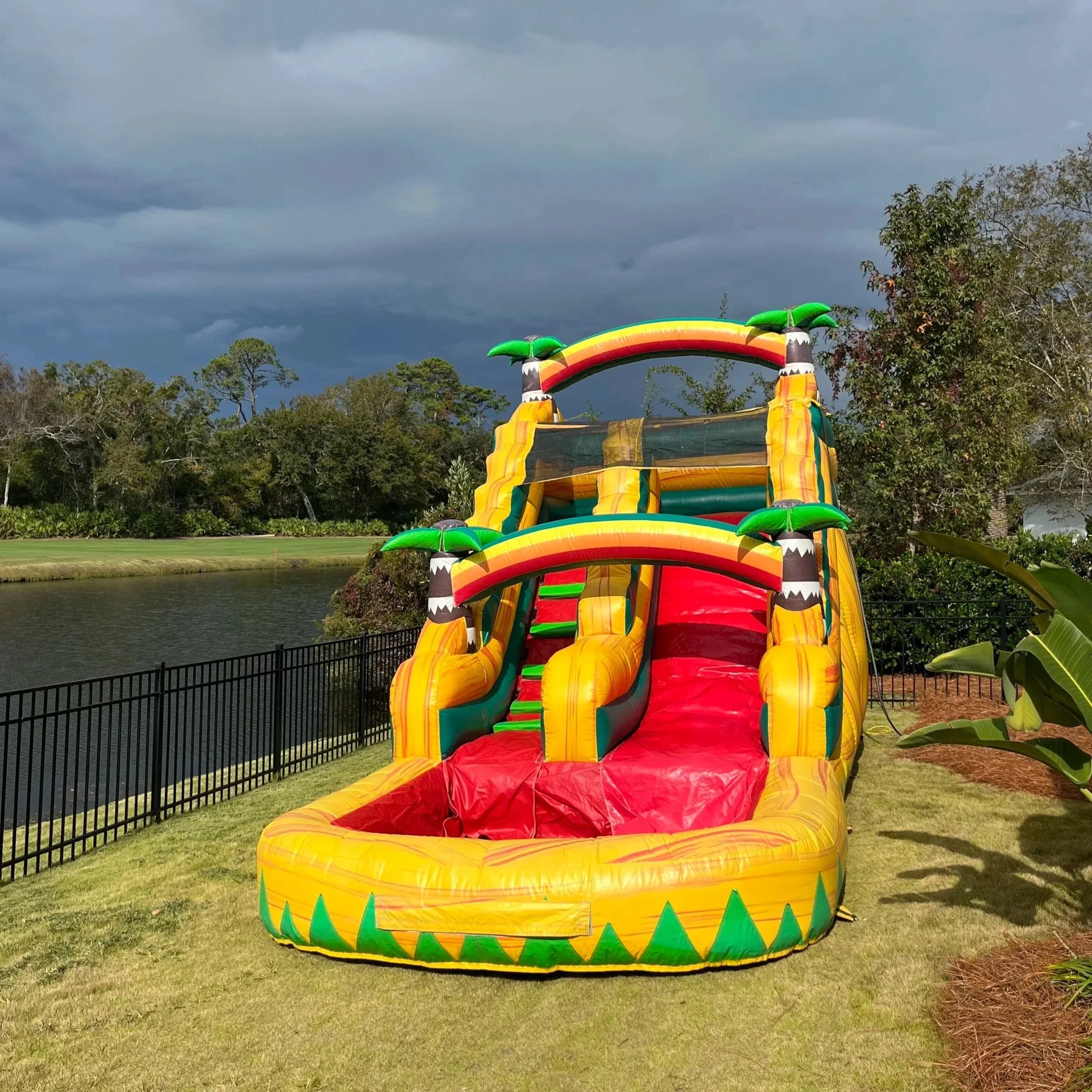 Sunshine Falls 16-ft waterslide rental from Bounce Brunswick, perfect for kids and family events.